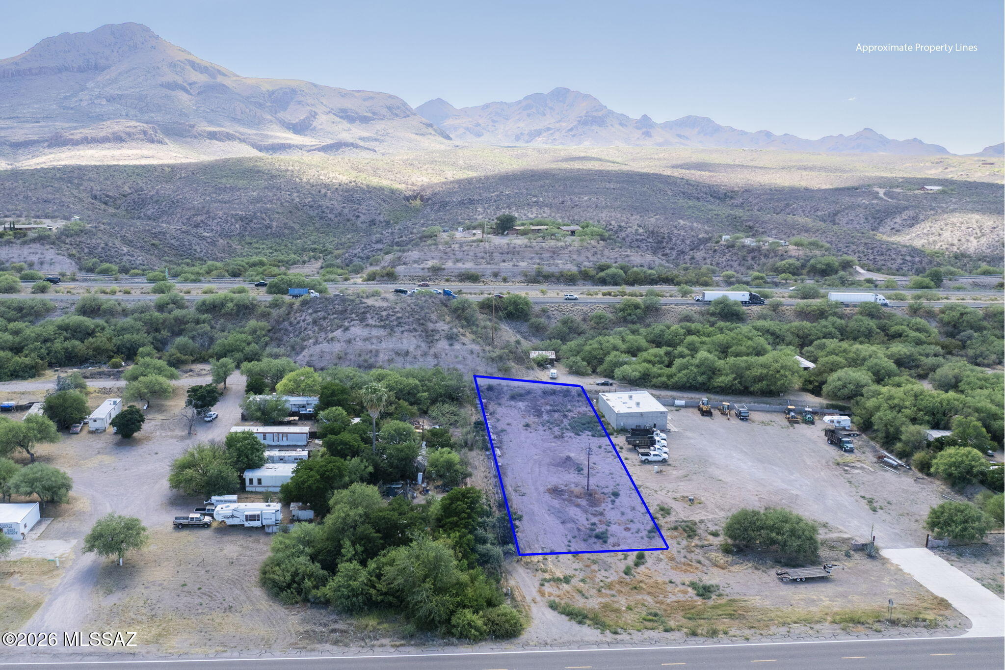 Discover the potential of Southern Arizona living with this 0.94-acre vacant parcel in the heart of Tumacácori. Conveniently located along the Frontage Road, this level lot offers easy access while maintaining the peaceful atmosphere and scenic beauty the area is known for. The parcel is zoned B-1 and has a well share with the adjacent parcel. Surrounded by stunning mountain views and open desert landscapes, the property provides an excellent opportunity to build your custom home, seasonal retreat, or investment property. Enjoy nearby historic attractions, outdoor recreation, and the charm of rural living, all within a short drive of local amenities and services.