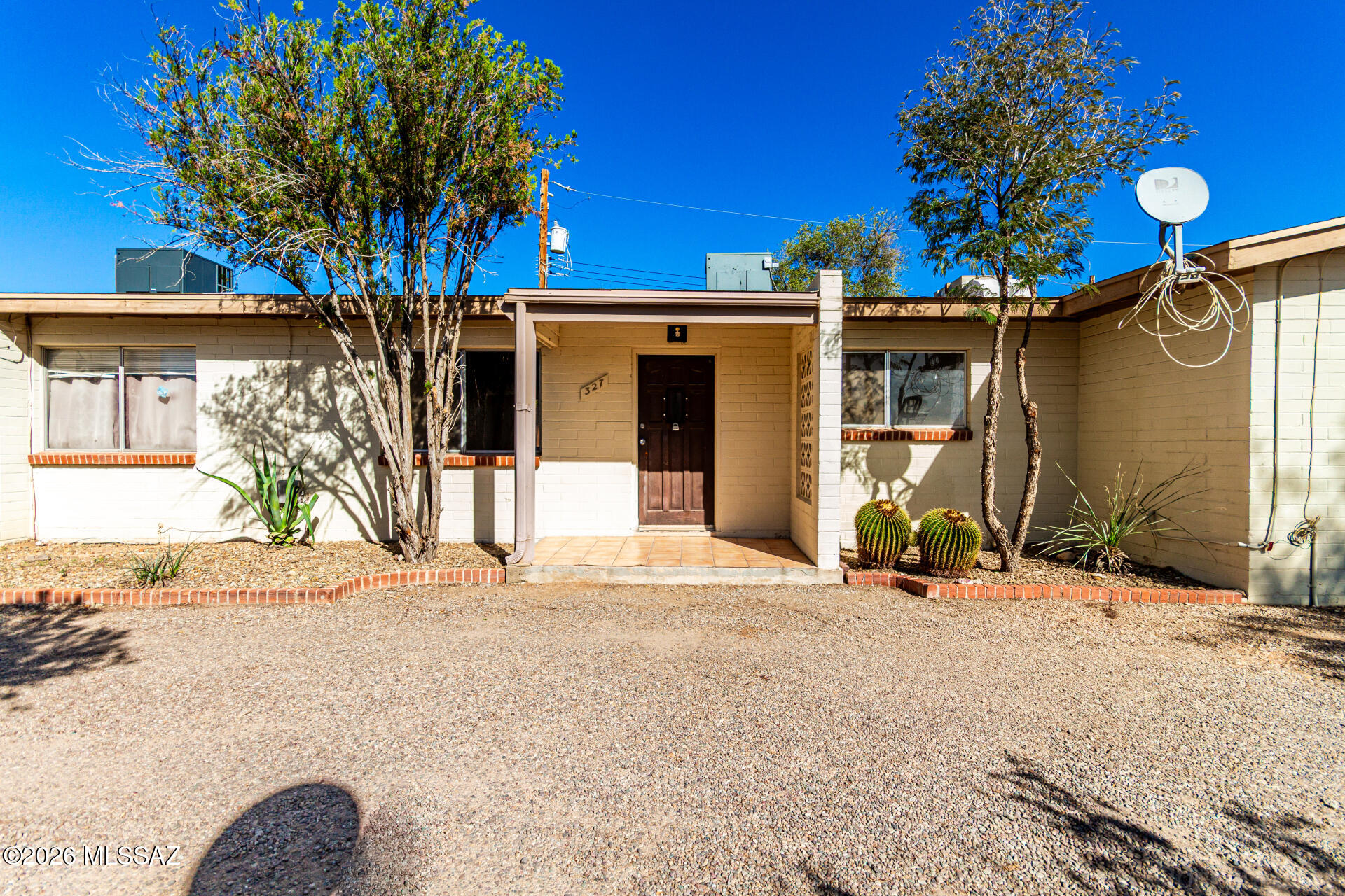 Don't miss this investment opportunity consisting of one Triplex and one Duplex on a single parcel. There are (4) two-bedroom/one-bath units and (1) one-bedroom/one-bath unit to make up a total of 5 individual rental units. All two-bedroom units have an identical floor plan. Each 2/1 unit has vaulted ceilings with wood beams and a variation of ceramic tile, wood-look laminate, and carpet. All rentals have A/C units, fenced yards, as well as washer & dryer hook-ups on each back patio. There is one covered carport space and one storage closet for each unit. Tenants pay their own utilities (Electric+Gas+Water/Sewer/Trash). Current rents are below market value. Do not disturb existing tenants. Please call us with questions. The owner of the property is a licensed Realtor in the State of AZ.