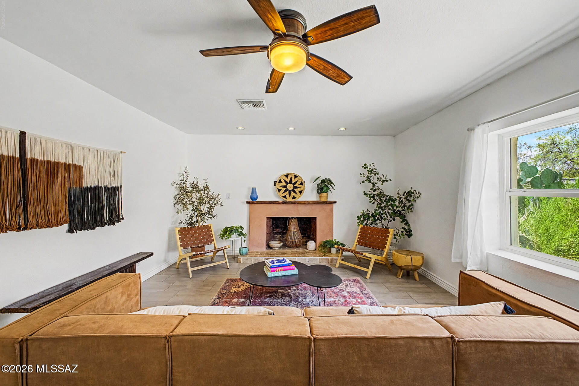 Prepare to fall in love with this charming 4-bedroom home complete with a sparkling pool and a fully equipped casita! Upon entering, a welcoming living room greets you, enhanced by tile flooring, tons of natural light, and a cozy fireplace that will keep you warm in the cooler months. Adjacent to it is the dining area, offering French doors leading to the back patio. Impeccable kitchen displays recessed lighting, tile backsplash, stainless steel appliances, and plenty of cabinetry. The bedrooms in the main house are comfortably sized. As an added bonus, you will also have a casita providing an ideal space for guests and multigenerational living. Spacious backyard boasts a play area, gazebos, and a swimming pool. The property also features an underground sauna, a fully powered shipping containerthat would be ideal as a workshop, and solar panels that have at least 6 years of prepaid lease.