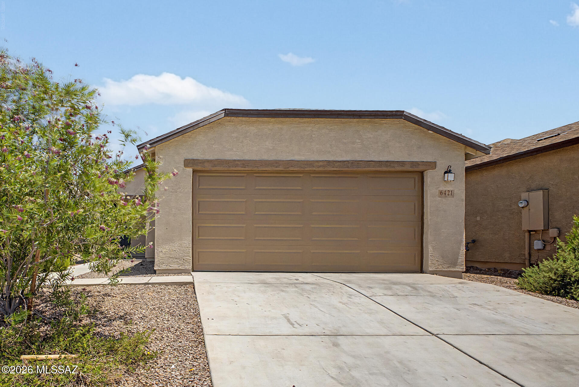 Looking for a new home? This charming single-level residence in Reserves At Valencia Crossing is the one! Offering 3 beds, 2 baths, a 2-car garage, and a low-care landscape. Enter to find a seamlessly flowing open layout, designed for everyday living & entertaining! A neutral palette creates an inviting atmosphere, complemented by abundant natural light, tile flooring in common areas, and soft carpet in bedrooms. The kitchen boasts SS appliances, recessed lighting, wood cabinetry, a pantry, and a peninsula w/breakfast bar. The primary bedroom has a walk-in closet and a full bathroom w/dual sinks. The large backyard awaits you with a covered patio, well-laid pavers, & artificial turf! No neighbors behind, adding extra privacy. Near schools, plus easy access to the I-10! Don't miss this gem!