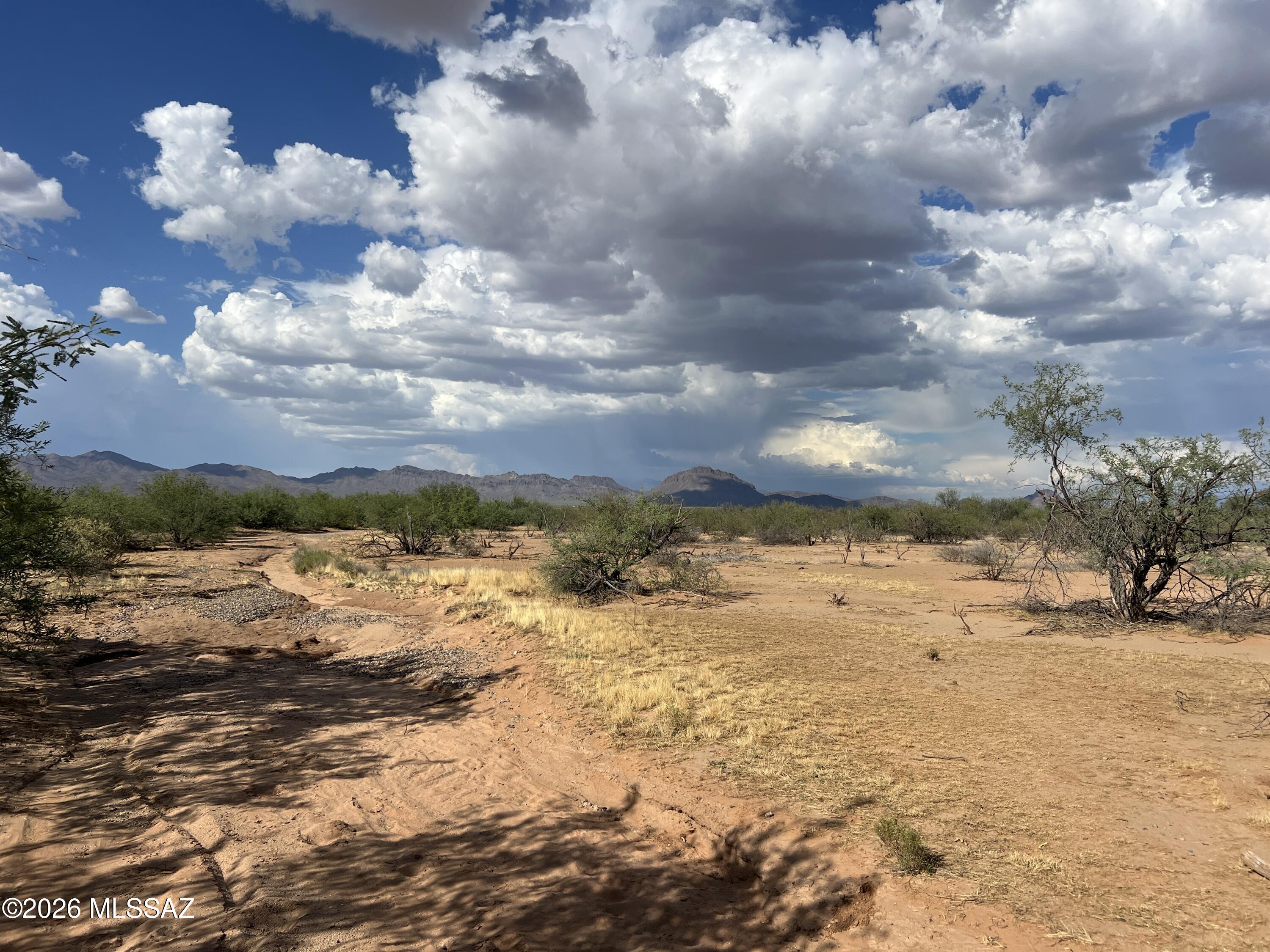 Nice flat piece of land with RH zoning that allows for multiple uses. Bring your manufacture home or build your new home and enjoy the panoramic mountain views. 
Property 11350 W Peaceful Lane is next to this one, it is also a 40 acre parcel with private well, 3 septic tanks and electric to property. Bundle and save. MLS #22616003