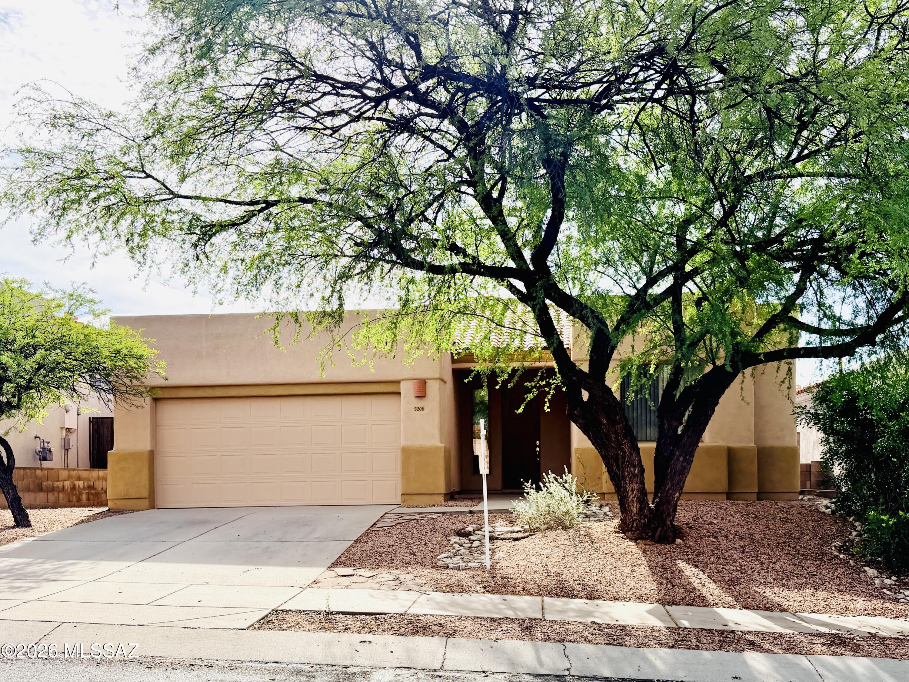 Gorgeous 4 bedroom in Sabino Springs gated community! Previously a model home, this 4 bedroom 2 bath has a great split bedroom floorplan & wonderful features including mature landscape, community pool and walking paths. Close to everything the Northeast side has to offer, this home is a must see!