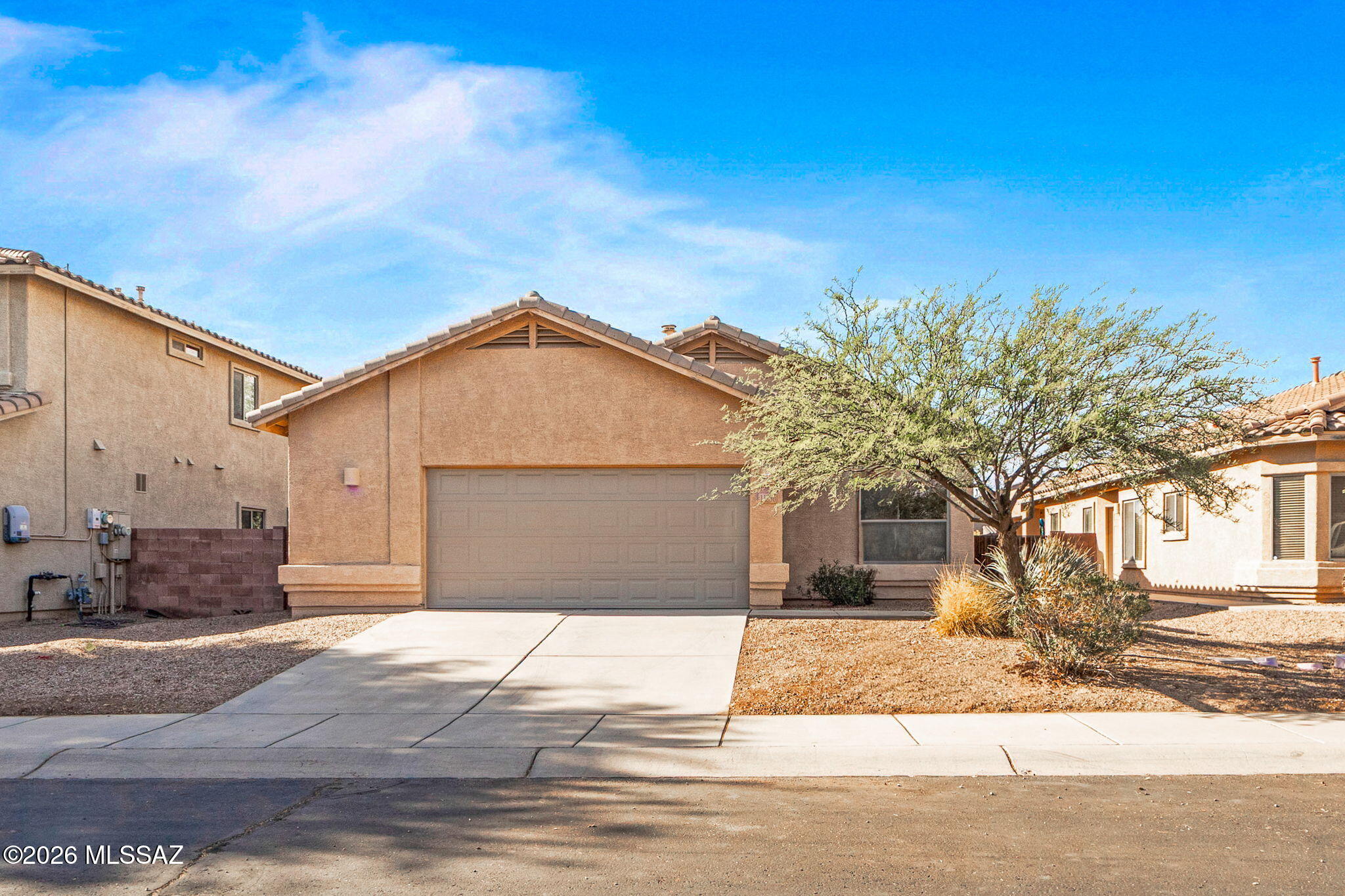 Welcome to your perfect starter home in the desirable Rancho Marana community, right on the edge of beautiful Gladden Farms. This charming residence offers 3 spacious bedrooms, 2 full baths, and an open-concept living area designed for comfort and connection.

Thoughtful, cohesive finishes--from the flooring to the cabinetry to the paint--create a clean, intentional look throughout the home. The extended brick patio is ideal for outdoor dining, relaxing, or entertaining under Arizona skies. The generously sized backyard is a blank canvas, ready for your personal touch, garden, or future upgrades.

This is a home that feels inviting the moment you step inside. Come see the space where your next chapter can begin today.