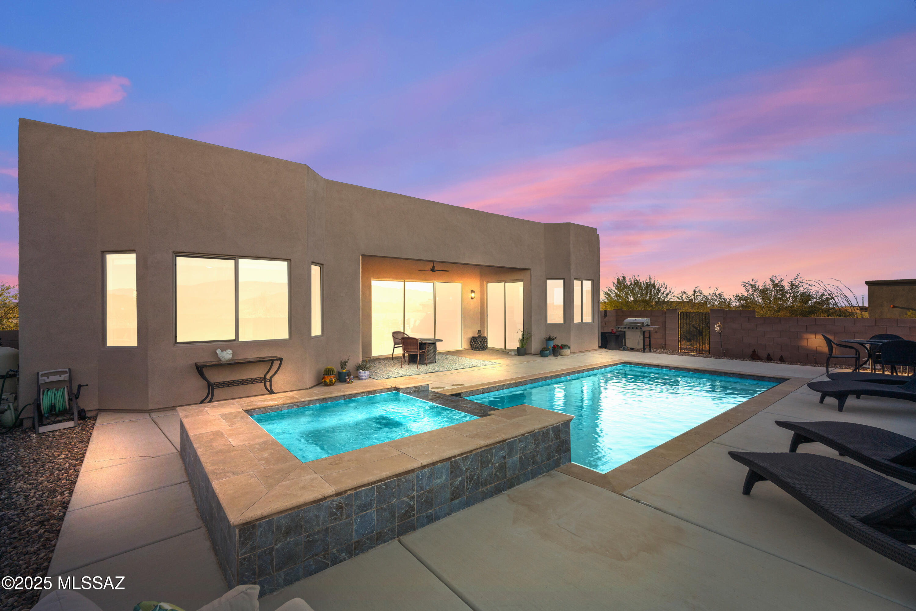 Beautifully appointed 2-bedroom + den/office that could serve as a third bedroom, 2-bath home in the highly desirable Mountain View Ranch community, offering breathtaking desert, mountain, and sunset views. Designed for comfortable living and effortless entertaining, this thoughtfully crafted home features an open-concept floor plan with a bright and spacious great room that seamlessly connects to the kitchen and dining area.

The well-equipped kitchen showcases a large center island, stainless steel appliances, abundant cabinetry, and a charming bay window dining nook that captures natural light and scenic views. Hunter Douglas window coverings throughout--including select remote-controlled and room-darkening shades--add style and convenience. The private primary suite serves as a relaxing retreat with dual vanities, a walk-in shower, and a generous walk-in closet. A separate guest bedroom and full guest bath provide privacy for visitors, while the dedicated office offers flexibility for remote work, hobbies, or additional living space. A spacious laundry room with utility sink adds everyday convenience.

Step outside to your resort-style backyard oasis featuring a sparkling saltwater pool, elevated spa, covered patio with fan, and expansive deck area--perfect for entertaining or simply enjoying Arizona's spectacular mountain and sunset views. Low-maintenance desert landscaping completes the outdoor setting.

Additional highlights include ceiling fans throughout the home and on both front and rear patios, utility sinks in the laundry room and garage, recently painted exterior, garage floor coating, water softener, downspout gutters to help protect mechanical systems, covered front patio, and energy-efficient 2x6 exterior wall construction.

This exceptional home combines comfort, quality, and stunning outdoor living in one remarkable package.