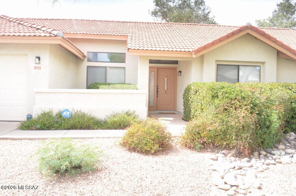 3 bedroom/2 bath highly  desirable  Sabino Canyon location in Catalina Foothills School district!  Cozy fireplace in great room off the kitchen with all stainless steel appliances, spacious living area with patio access, adjacent dining area, split location 3rd bedroom may be used an den/office, walk in shower in guest bath, conveniently located near shopping and Sabino Canyon recreation area.