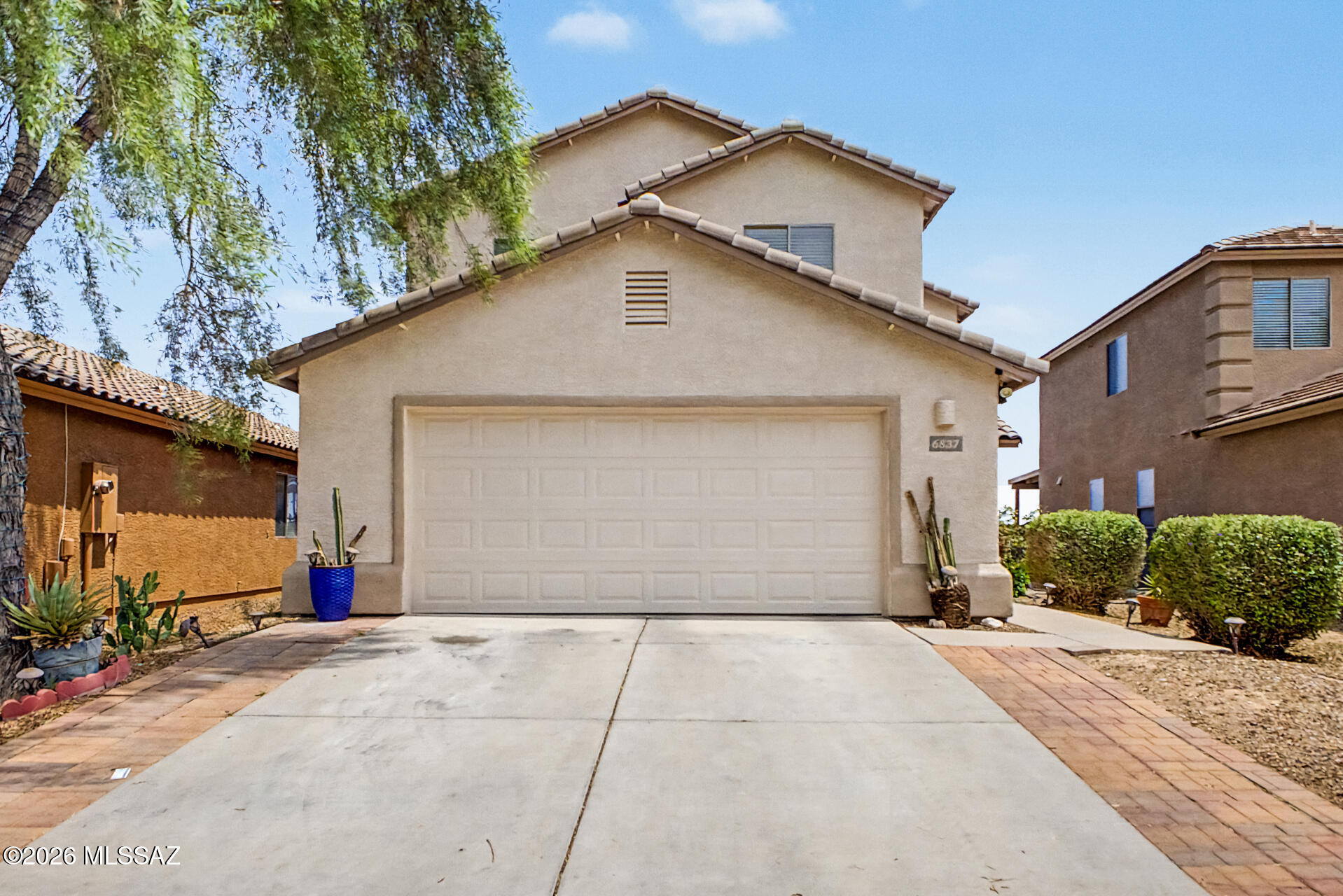 Check out this charming two-story home that perfectly combines comfort and convenience! Discover an inviting open floor plan bathed in natural light, featuring tile flooring, plantation shutters, neutral palette, and ceiling fans throughout. Lovely kitchen displays abundant honey oak cabinets, recessed lighting, stainless steel appliances, granite counters, and a center island with a breakfast bar. Upstairs, you'll find an airy loft ideal for an entertainment area or playroom. Sizable primary bedroom offers a relaxing retreat, complete with plush carpeting and a private bathroom with a sit-down shower. Venture to the spacious backyard, where a covered patio and pergola create the perfect setting for weekend barbecues or quiet evenings spent enjoying the mountain views. Don't miss out!