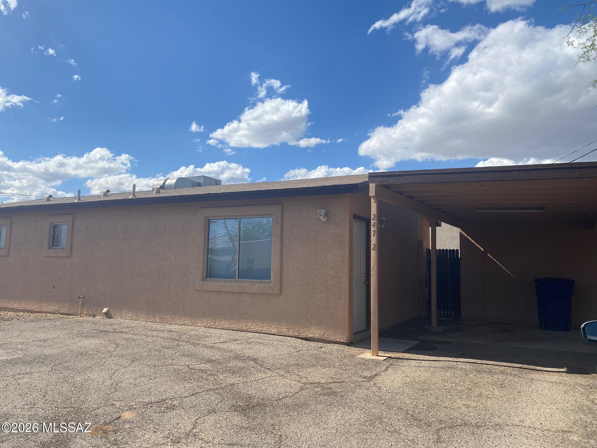 2 bedroom/2 bath home with one car carport and storage shed. Recently updated, this home has tile throughout, fresh interior paint, new blinds and a home alarm. Small yard. Pets are upon owner approval. Great central location near U of A, transportation and shopping!