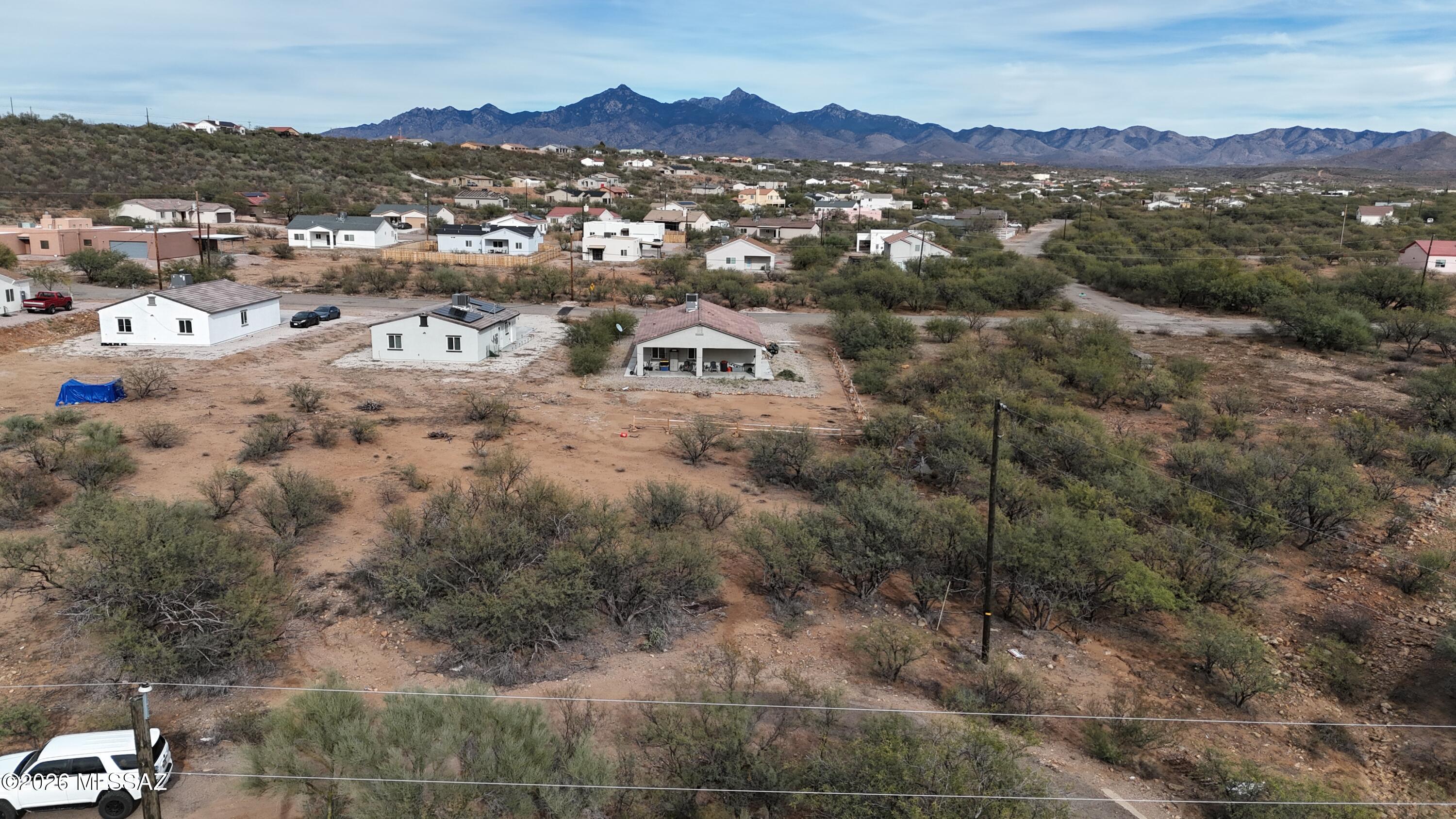 Lots in Villas 12 have water, electric and sewer available at the street.  Flat lot.