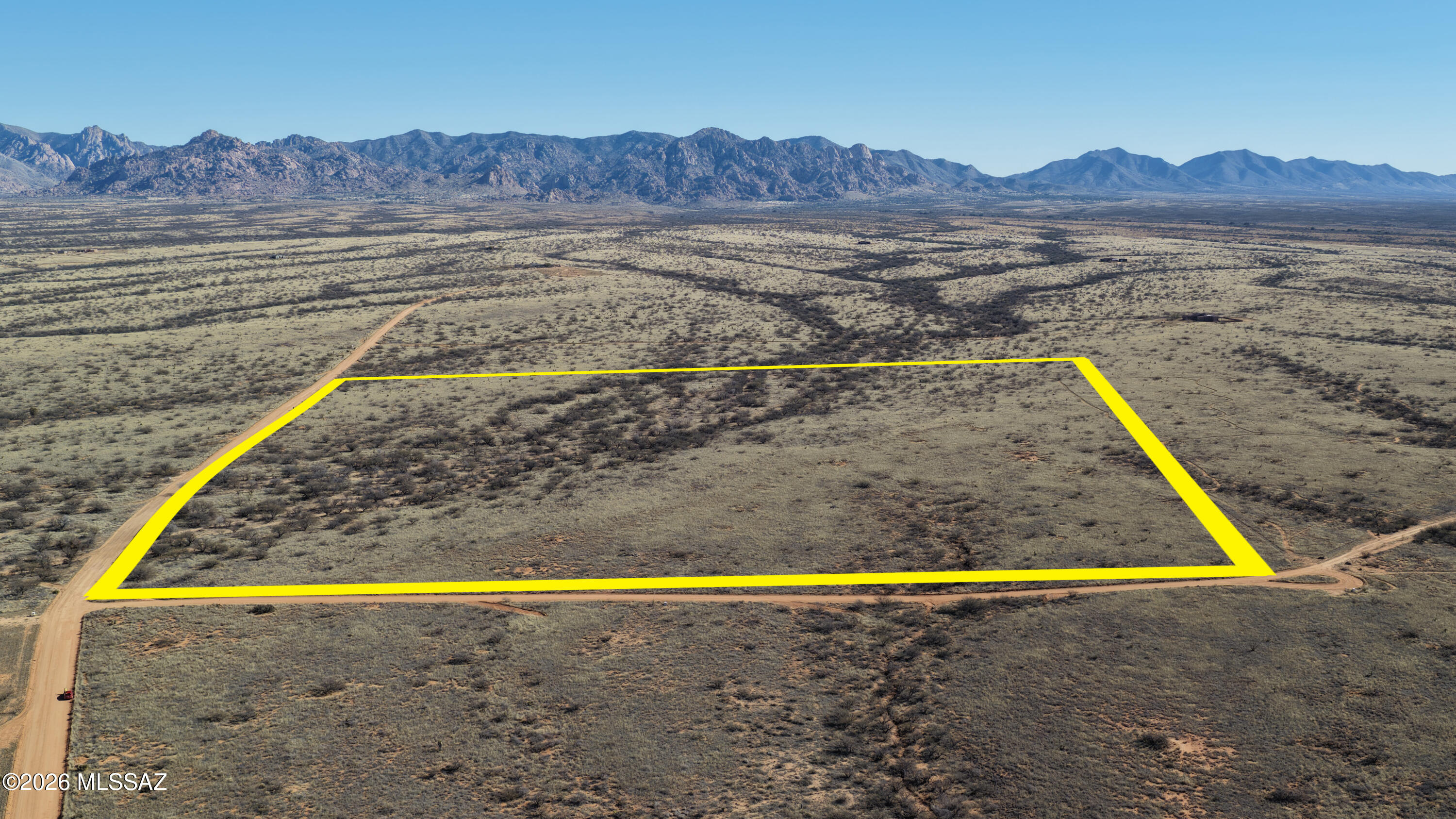 Escape to the wide-open beauty of Southern Arizona with this 36-acre lot in Dragoon Mountain Ranch, Saint David, AZ. Nestled in a gated community, this property offers unmatched privacy, tranquility, and breathtaking views of the legendary Cochise Stronghold. Imagine building your dream ranch, homestead, or retreat surrounded by rolling hills, endless skies, and the rugged Cochise Stronghold. Perfect for those seeking a rural lifestyle with space for horses, gardens, hiking, or simply peace and quiet. Yet, you're still close to Benson, Tombstone, and Tucson for convenience. Whether you're looking for a private getaway or a long-term investment, this lot delivers the best of Arizona living. Claim your piece of paradise today—schedule a visit and see the views for yourself.