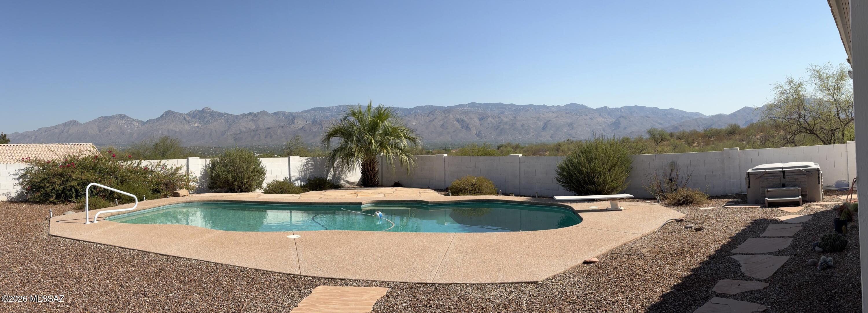 Tucson Living at Its Finest! Nestled on a quiet cul-de-sac in the coveted Tanque Verde School District, this stunning 4-bedroom, 3-bath home offers 2,519 sq ft of thoughtfully designed living space with north-south orientation. Step inside to a bright, open floor plan that flows seamlessly to your private backyard oasis complete with a sparkling pool & breathtaking mountain views. The 3-car garage provides ample space for vehicles, storage, or a workshop. Located in one of Tucson's most desirable eastside neighborhoods, you're minutes from top-rated schools, hiking trails, & the natural beauty the Sonoran Desert is famous for. Whether you're entertaining poolside or watching the amazing Arizona sunsets, this home delivers the ultimate Arizona lifestyle. Welcome to your new home.