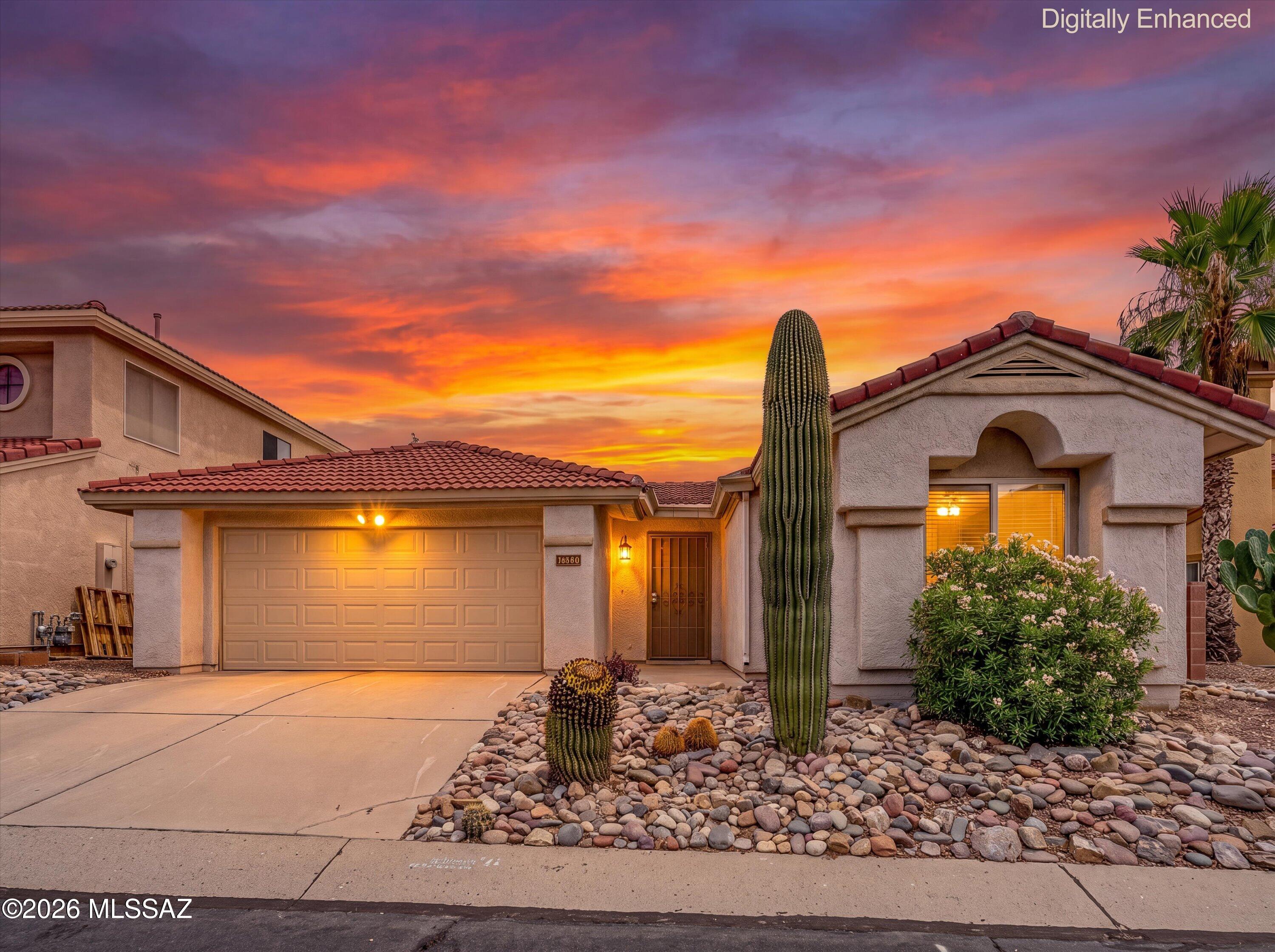 Welcome home to this beautifully updated 3-bedroom, 2-bath residence offering 1,181 square feet of thoughtfully designed living space in one of Oro Valley's most desirable communities. Featuring a split-bedroom floorplan, extensive updates, Catalina Mountain views, and a community pool just a short walk away, this move-in ready home offers the perfect blend of comfort, style, and convenience.
Designed with both style and function in mind, the beautifully remodeled kitchen showcases timeless white shaker cabinetry, granite countertops, stainless steel appliances, recessed lighting, and generous counter space. Just beyond, the bright breakfast nook overlooks the backyard through a large picture window and opens directly to the covered patio, filling the space with natural light and creating the perfect spot to enjoy your morning coffee or casual meals.
An arched pass-through connects the kitchen to the formal dining room, while soaring vaulted ceilings, beautiful wood-look flooring, and abundant natural light create a warm and inviting atmosphere throughout the adjoining great room. Whether you're entertaining guests or enjoying a quiet evening at home, the thoughtfully designed layout offers comfortable spaces for everyday living.
Privately situated from the secondary bedrooms, the spacious primary suite provides a peaceful retreat complete with a beautifully remodeled ensuite bathroom featuring granite countertops, updated cabinetry, designer lighting, and a beautifully tiled walk-in shower.
Two additional bedrooms provide flexibility for family, guests, or a home office, while the updated guest bathroom continues the same timeless finishes and quality craftsmanship found throughout the home.
Step outside to enjoy Arizona living at its finest. The covered patio extends to an inviting flagstone overlooking the low-maintenance backyard with Catalina Mountain views, creating the perfect setting for morning coffee, outdoor dining, or relaxing while enjoying the peaceful desert surroundings.
Ideally located just minutes from shopping, restaurants, golf, and top-rated schools, this exceptional home is also close to neighborhood parks, walking and biking paths, sports fields, and the community pool, offering an active lifestyle right outside your door.
Beautifully updated, impeccably maintained, and ideally located--this is a home you won't want to miss.