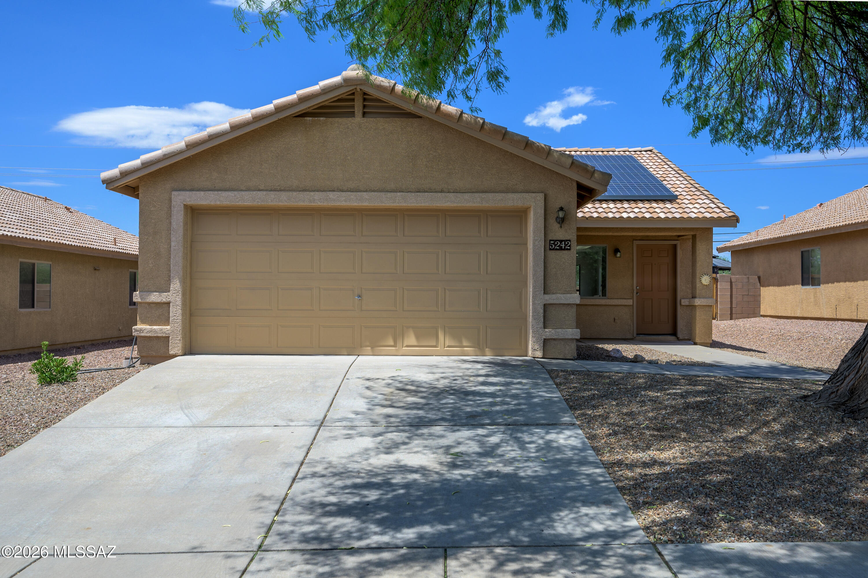 Welcome home! The first thing you'll notice is the beautiful mature shade tree that adds to the homes curb appeal. As you step through the front door, you're greeted by tall vaulted ceilings that make the home feel open and inviting. An abundance of natural light and fresh interior paint create a bright, welcoming atmosphere throughout. This three bedroom, two bathroom home offers a functional layout, while the primary suite features a walk in closet and private ensuite. The washer and dryer are included, and with no rear neighbors and a spacious two car garage, you'll enjoy both convenience and added privacy. Conveniently located near shopping, restaurants, and easy access to I-10, this home offers a wonderful opportunity for its next owner. Schedule your showing today!