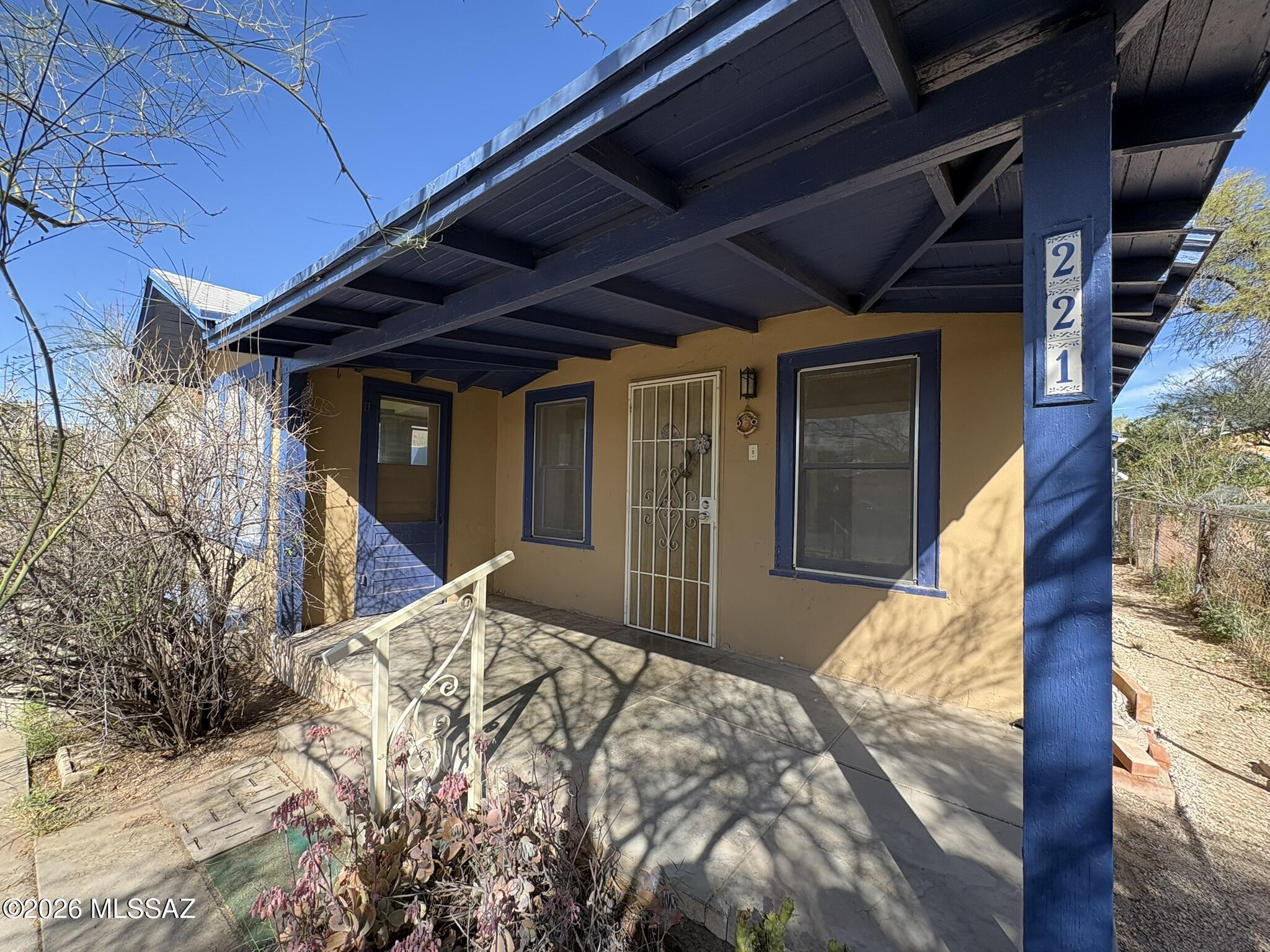 Affordable and adorable vintage home close to the U! Charming 1925-built 2 bed/1 bath bungalow in historic Feldman's Neighborhood Schumaker Addition. Walk to 4th Ave or the U of A. Wood floors. Unusually large primary bedroom with 2 closets and a private patio. Sunny second bedroom. The front porch is covered, and the perfect spot to chat with neighbors. Dedicated laundry casita is just outside the back door, off the large covered patio. Decent-sized corrugated workshop way in the back. Super deep 150 ft, C2-zoned lot allows for many uses. This property is possibly the most perfect candidate for adding an ADU/Guest House. Currently heated with space/wall heaters, and cooled with evap cooling. Range priced 249,200 to 266,000. Seller will install new HVAC with AC with full priced offer. See estimate in attached documents.

Call for an appointment today!