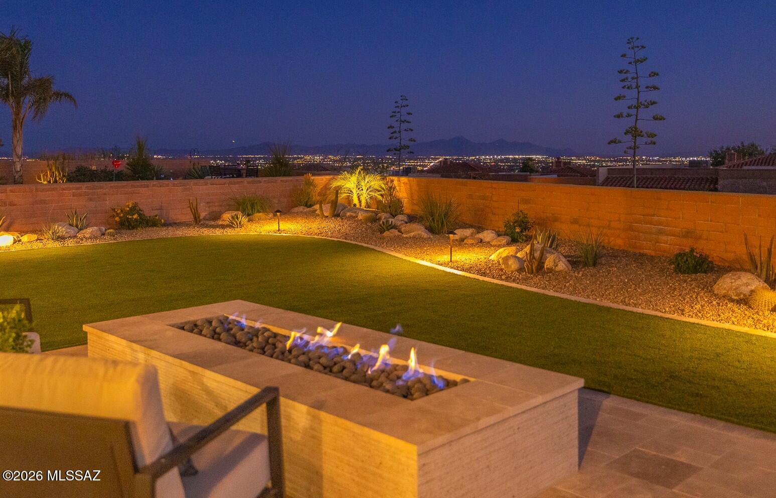 Best of the Best! At the Summit of coveted Fairfield Sunrise East, this stunning Foothills Renovation seamlessly embraces incredible Panoramic Views & sophisticated lifestyles. Owner's diligent, creative & thoughtful approach provides intimate living spaces that promote comfort & connection. Oversized light-filled Bedrooms & spacious Den/Office surround the Great Room design concept. Stunning Tile/Wood accented Modern Fireplace anchors the Great Room while 16' x 8'' Sliding Glass Doors ease transition to sublime outdoor living. Inviting wrap-around Travertine patios w/ stunning view-focused Gas Fireplace. Elegant Contemporary Kitchen pops w/ luxurious Italian Cabinets, premium Bertazzoni Appliances & Marble Counters. Gorgeous Primary Suite w/ elegant spa-like Bathroom/Closet integration.