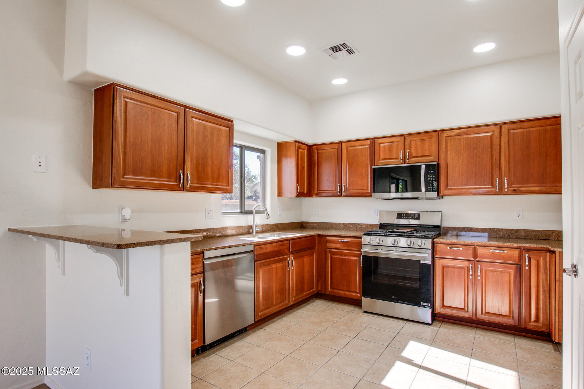 Welcome to this beautifully refreshed contemporary 2-story home in sought-after Rancho Sahuarita. Recent upgrades include plush new carpet, fresh interior paint, stainless steel appliances, a new HVAC system, and a new tile roof with fresh exterior paint. Step outside to your private backyard oasis with a covered patio, vibrant turf, and stylish pavers. Just a short walk to Sahuarita Lake and community amenities. Don't miss this one!