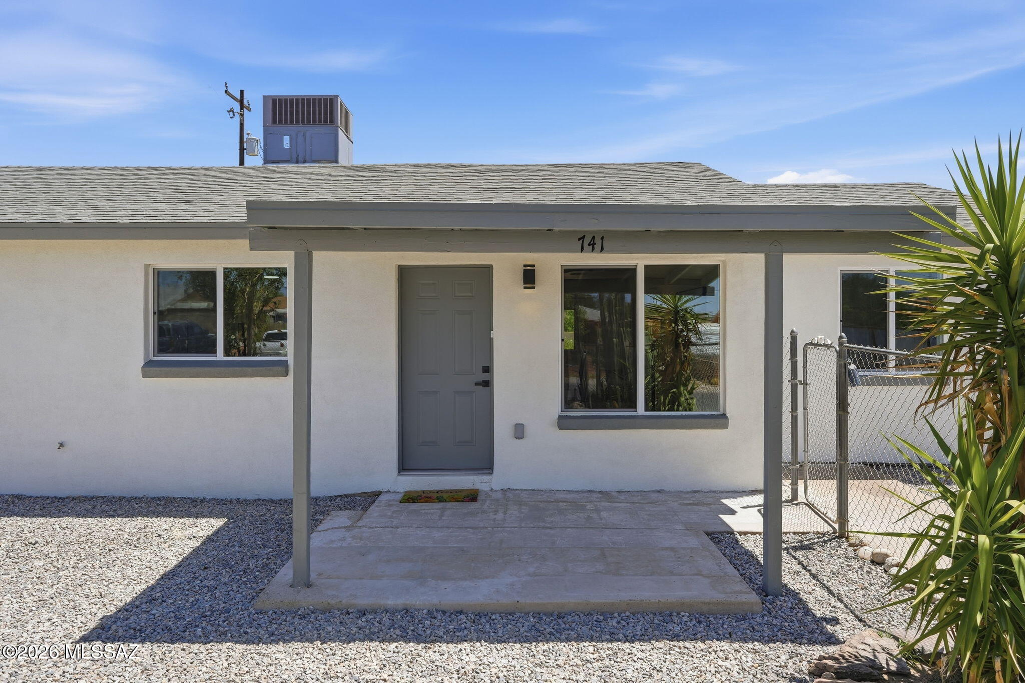Beautiful meets functional at this fully remodeled bungalow!  From the large fully fenced yard (front and back) to the backyard with privacy you will appreciate the space inside and out.  New Roof,  new dual pane windows, new stucco and fully painted inside and out.  Open concept  main living area is clean and bright.  New doors, trim and baseboards. Kitchen and Baths feature all new cabinetry with soft close features and Quartz countertops plus new Stainless steel appliances. Split bedroom floorplan.  Custom tile showers and both baths fitted with upgraded shower system with spray wand.  Flooring is all tile, NO carpet.  Open, modern and bright rooms filled with great natural light.  Laundry room with hook ups for full size units and is temp controlled.  Huge fenced yard with double gate at both front and back, providing potential drive through access and more than enough off street parking as needed or space for a RV or work trailer/truck.  With gorgeous finishes and a fantastic location providing quick easy access to I-10, downtown, great shopping and entertainment opportunities are just minutes away!