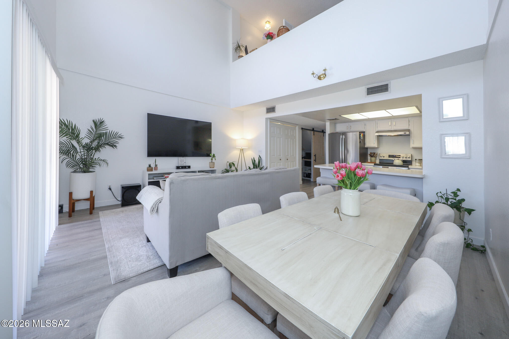 WITH ACCEPTABLE OFFER- SELLER OFFERING UP TO $8000/ 3% CREDIT TOWARDS A 2-1 INTEREST RATE BUYDOWN (REDUCING BUYER'S RATE BY 2% IN YEAR 1 AND 1% IN YEAR 2) SIGNIFICANTLY LOWERING MONTHLY PAYMENTS. (ACTUAL COSTS DEPENDS ON LOAN AMOUNT AND LENDER QUOTE, AND SUBJECT TO LENDER AND CONTRACT TERMS- Gorgeous updated townhouse in a highly sought-after East Tucson location! Filled with natural light, this home features a desirable split floor plan with the primary suite upstairs and a full bedroom and bathroom downstairs, Ideal for guests or multi-generational living. Recent updates include new flooring, upgraded appliances, and a custom pantry addition under the stairs for extra storage. Enjoy low-maintenance living with HOA-covered roof, trash service and exterior maintenance. Move in ready!