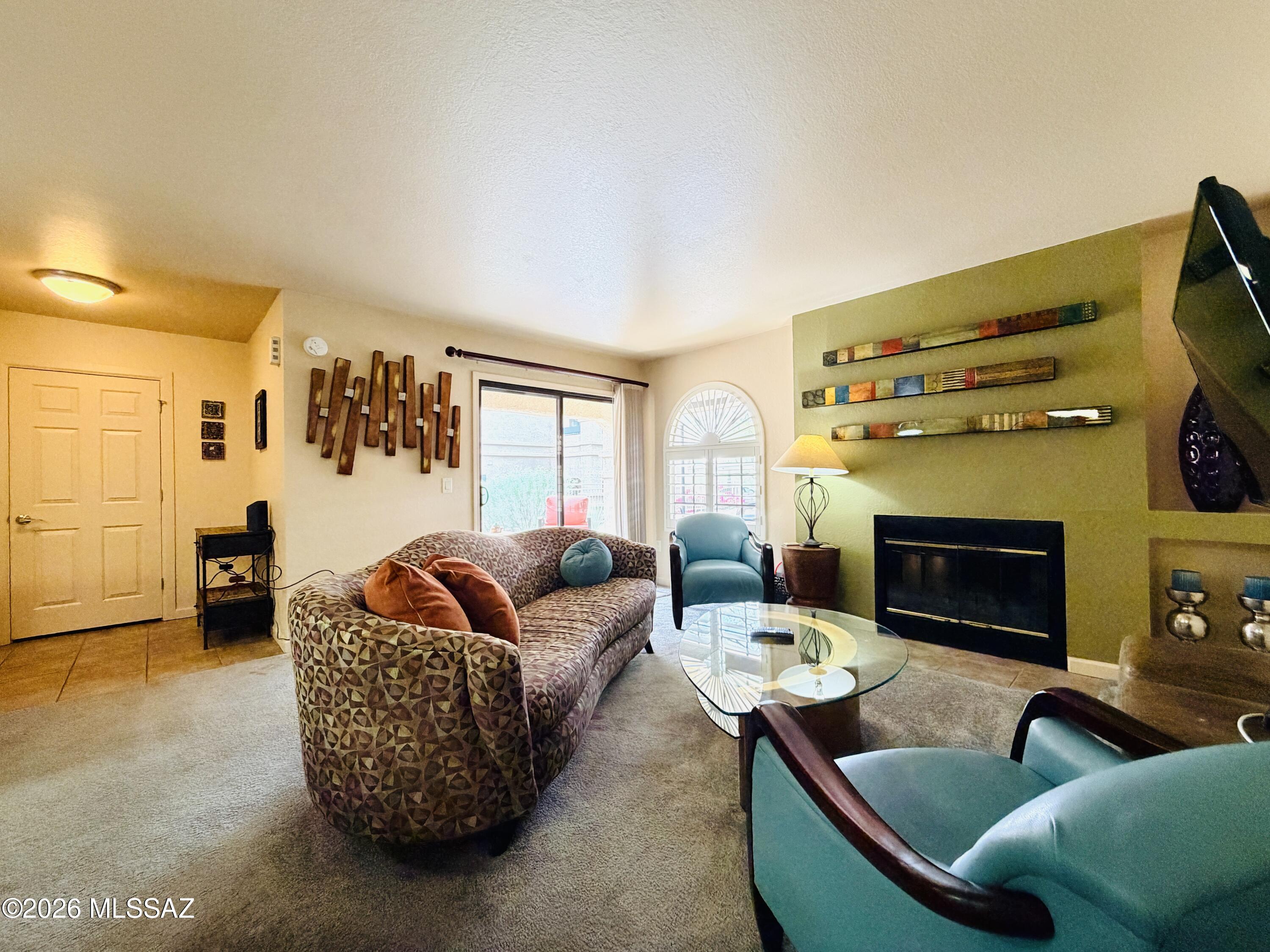 Available 7/9/2026 onward. Welcome to Moonrise at Starr Pass, where condos offer resort style living with amenities! This 2 bed/2 bath fully furnished downstairs Condo is tastefully decorated with modern furnishings, a Wood-burning Fireplace in Living Room, Kitchen w/granite Counter Tops, & Stainless Appliances. Washer & Dryer in unit, Nest WiFi Mesh Network for great coverage, & a Covered Reserved Parking Spot near unit! Enjoy the Club House w/Swimming Pool & Spa, play Tennis, Golf, or just visit the Exercise Room. Near Downtown Tucson & the Starr Pass Resort. 6-month lease minimum. Tenant is responsible for all utilities (Electric, Internet &Cable). EMS Realty represents the Landlord only on this listing