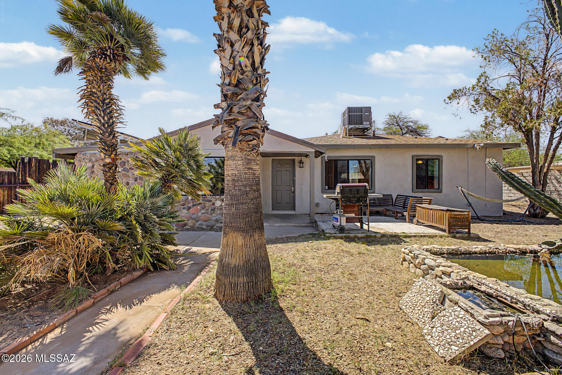 PAID SOLAR WITH MOTIVATED SELLERS!! Step into a piece of timeless charm with this beautifully updated 3-bedroom, 2-bathroom home that perfectly blends mid-century character with modern comfort. Built in 1950, this one-of-a-kind property showcases stunning interior rock work that adds warmth, texture, and a truly unique personality you won't find anywhere else.
Inside, you'll find brand-new carpet underfoot and a thoughtfully updated kitchen designed for both style and functionality, ideal for everyday living and entertaining alike. The home's classic bones have been lovingly preserved while modern upgrades ensure effortless comfort for today's lifestyle. Whether you're drawn in by the craftsmanship of a bygone era or the peace of mind that comes with modern updates, this home delivers it all. A rare find with character, comfort, and cost-saving features -- don't miss your chance to make it yours!
