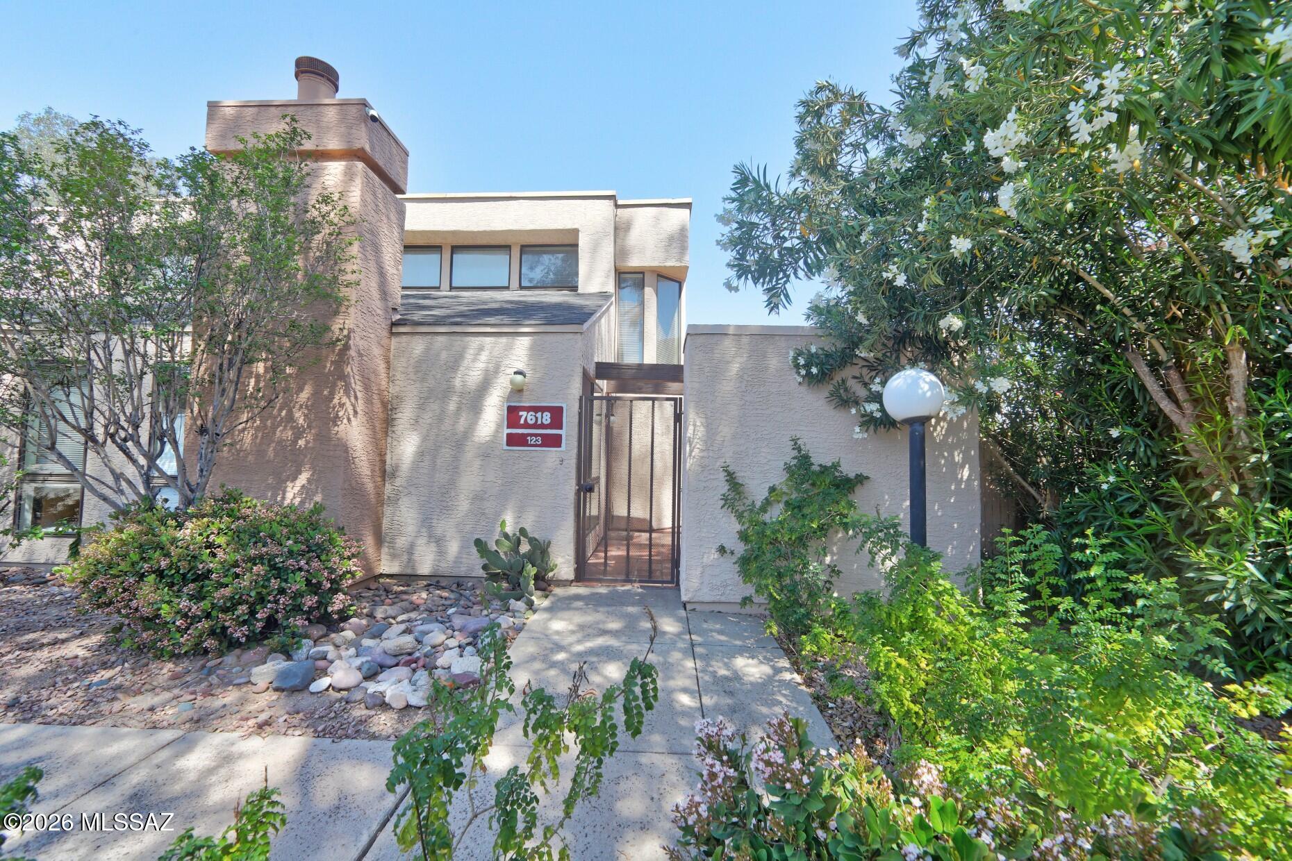 MARKET READY FOR QUICK & PROMPT SALE!!  Immaculate  & Beautifully maintained end unit home in Coronado Place.  Brand new Frigidaire Wash & Dryer and new Water Heater installed - never used. Light & Bright Loft Style Condo has 2 Bed/2 Baths with High Ceilings.  Warm Alderwood Kitchen Cabinetry has Pull-Out Shelves, Lazy Susan, Pantry and Eat-Up Breakfast Bar.  All appliances Convey. Newer AC installed in 2023.  Fireplace in Great room.  Walk-in Closet in 2nd Bedroom with Full Ensuite Bath.  Private Patio features Saltillo Tile and a Spacious Storage Closet.   HOA Covers Outside Paint, Roof Roads, Water & Sewer and Trash.  Convenient Covered Parking just Steps Away from the Home.  Extra Parking Close.  Close to Restaurants, Shopping and Park