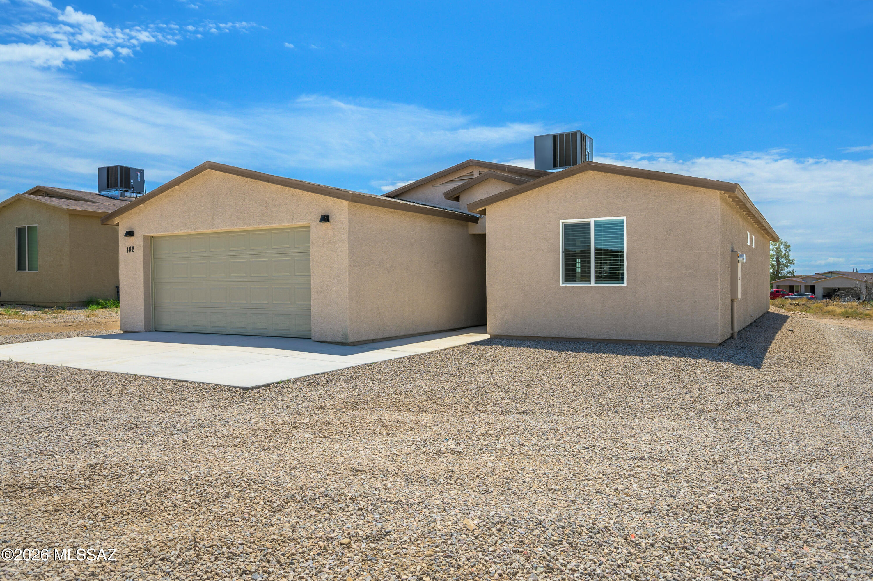 Welcome to this brand-new, thoughtfully designed home offering 3 bedrooms, 2 bathrooms, and 1,506 square feet of modern living space. The open floor plan creates a seamless flow, perfect for everyday living and entertaining. Enjoy the convenience of an attached two-car garage and the freedom of no HOA restrictions. Step outside to take in the stunning views of the Tucson mountains, providing a picturesque backdrop to your daily life. With brand-new construction, you can move in with confidence, knowing everything is fresh and ready for you to make it your own. This is more than just a home--it's a chance to create the lifestyle you've been dreaming of.