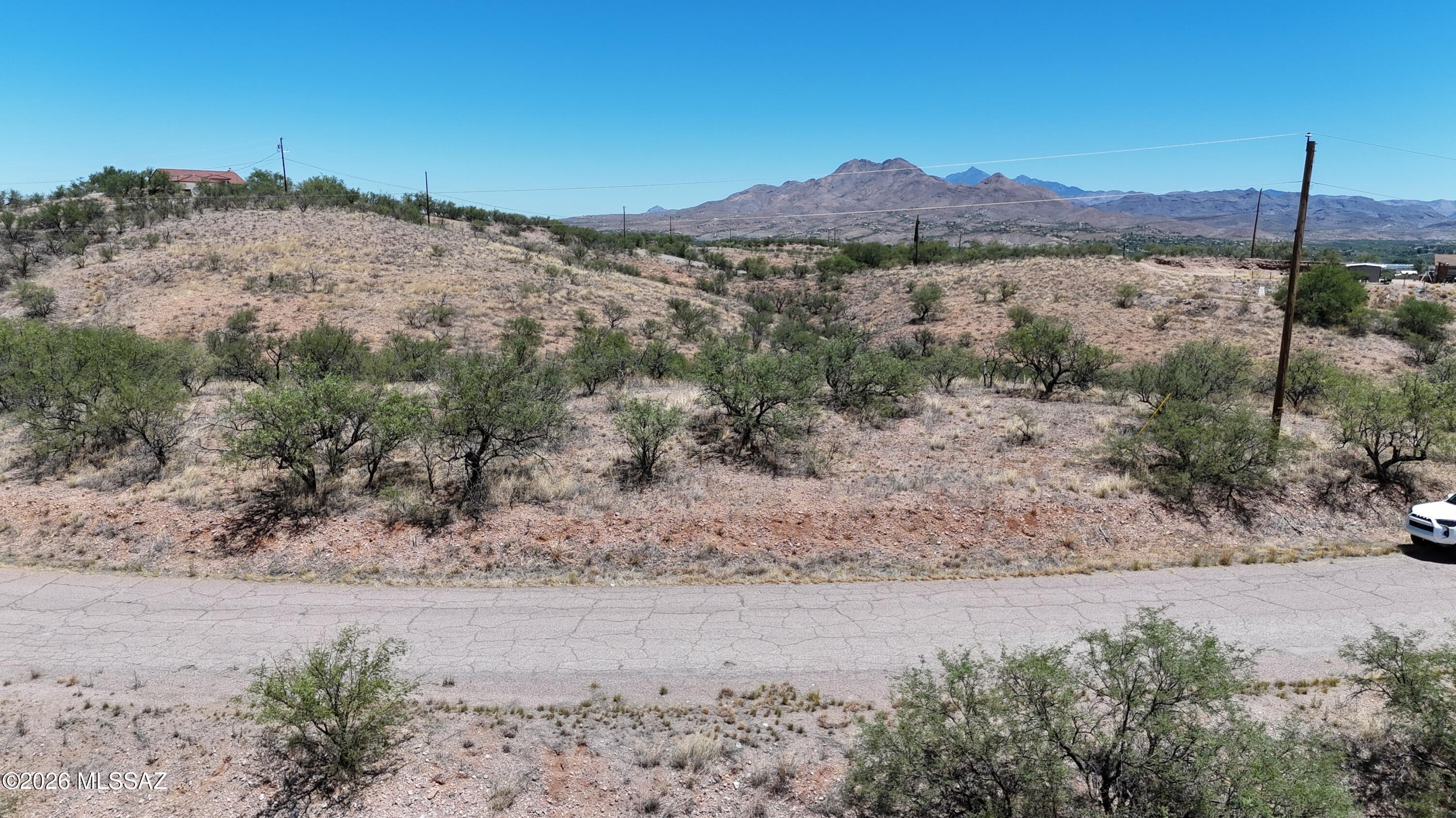 Half acre building site.  Paved roads, quite West side location.