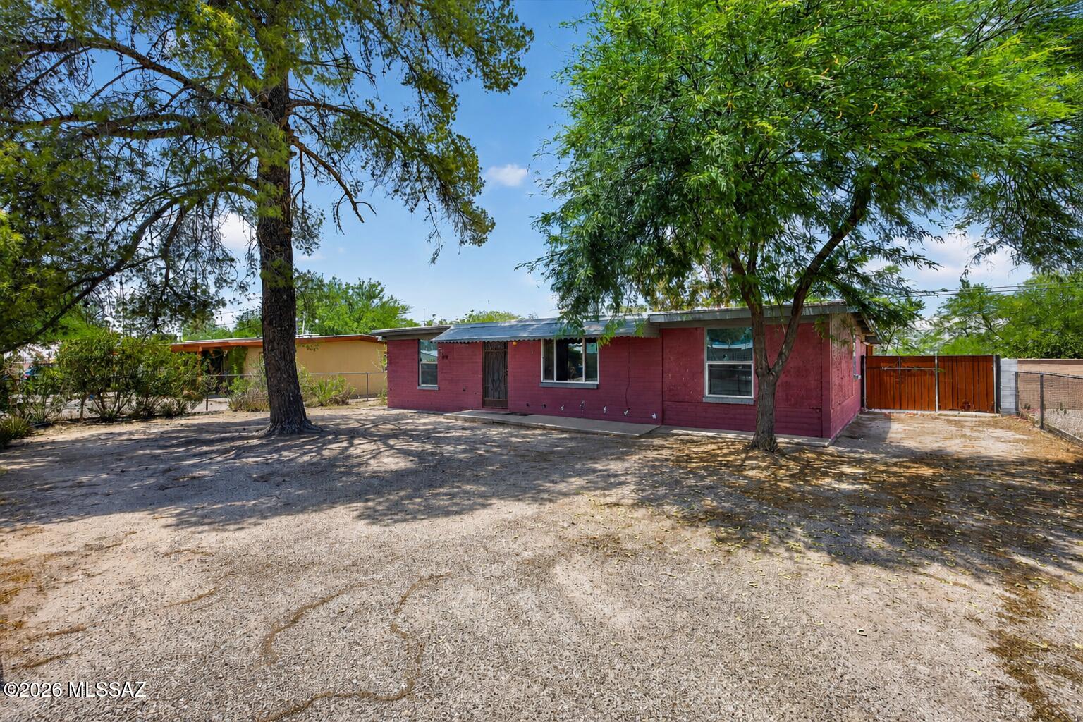 NO HOA! Whether you're a first-time homebuyer, growing family, investor, or someone looking for a home you can truly make your own. At just $219,900, this home offers exceptional value and endless potential in a convenient central Tucson location. Enjoy ample space, charming character, and a layout designed for comfortable living, while outside you'll find a generously sized yard with room to create the backyard of your dreams. Imagine family barbecues, a play area for children, a garden oasis, or even future additions, the possibilities are endless. Conveniently located in central Tucson, you'll enjoy easy access to shopping, dining, parks, schools, and everyday essentials. Just minutes from Park Place Mall, Reid Park, the Tucson Zoo, and golf courses. Schedule your private showing today and discover the possibilities waiting for you! **Buyer to verify all facts and figures, including square footage.** Home has been virtually staged to show you it's amazing possibilities.