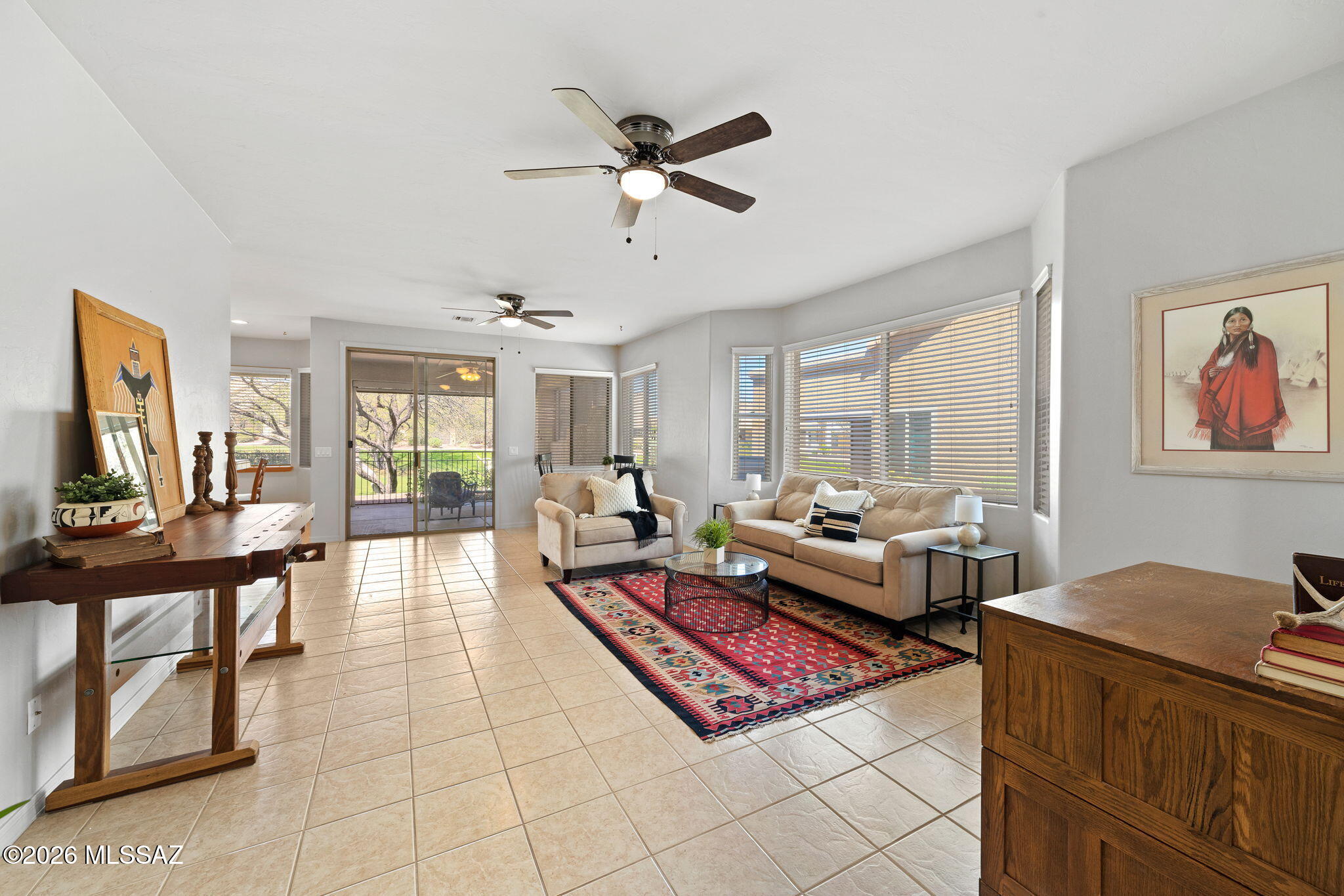 Truly move-in ready, this beautifully refreshed home features all new interior paint and a thoughtfully designed semi-open floor plan. Offering 2 bedrooms, 2 bathrooms, and a office.
A rare find, both bedrooms serve as primary suites, each complete with spacious walk-in closets, providing flexibility for guests or multi-generational living. The main suite also showcases dual sinks with an executive-height vanity for added comfort.
The kitchen is both stylish and practical, featuring stainless appliances, attractive cabinetry, and an easy flow into the main living areas.
Step outside and enjoy your electric screened in Arizona room, or step out your gate and enjoy the gorgeous green park. 
Whole home water softner, epoxy garage, and lots of charm. HOA maintains the exterior of the prope including paint, roof (roof replacement), garbage, pest control, gated community, street maintenance, landscaping, and basic cable TV.