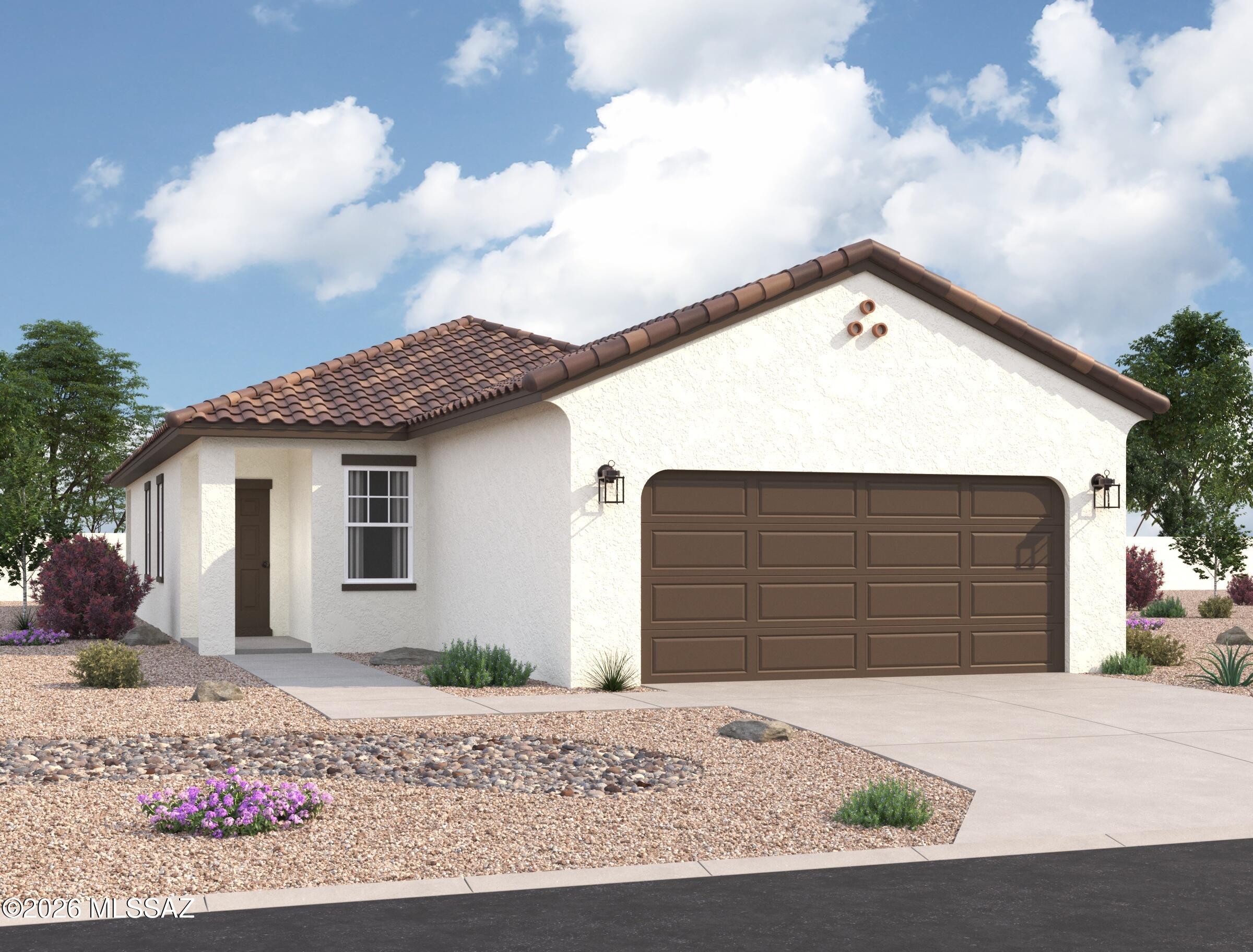 The Steward plan is brand new and so practical!  This is a corner lot with landscaped common area behind it so no one behind. Beautiful, brand-new homes featuring thoughtfully designed floorplans in the scenic Tucson community of Star Valley! Conveniently located with easy access to I-19 and major Tucson destinations, this community offers the perfect balance of comfort, convenience, and outdoor living. Homes showcase desirable upgrades including 9' ceilings, white shaker cabinets, Shaw 17'' x 17'' tile flooring, and granite kitchen countertops. Each home comes move-in ready with stainless steel kitchen appliances, including a refrigerator, washer, and dryer. Energy-efficient features include Low-E dual-pane windows and a Wi-Fi programmable thermostat to help maximize comfort and savings. Exterior highlights include front yard desert landscaping with irrigation, covered patios, and spacious backyards designed for enjoying Tucson's beautiful sunsets. Residents enjoy community amenities including large park with soccer fields; walking paths and natural trails; children's play area; basketball courts; tennis courts; pickleball courts; natural-area dog park and incredible mountain views everywhere! This welcoming community offers the perfect combination of modern living and the natural beauty of the Tucson desert.