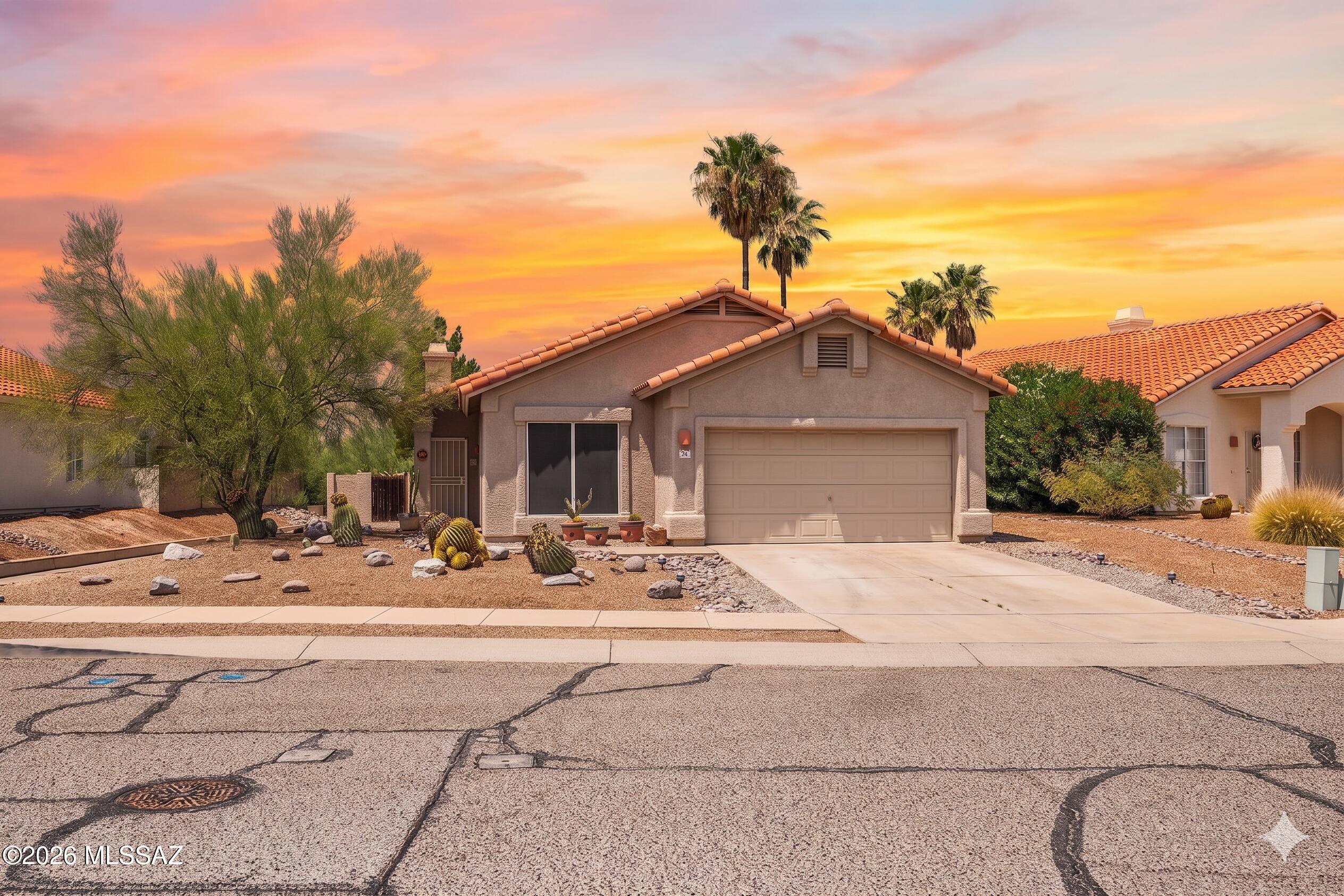 Discover your private desert oasis in this pristine ONE Owner 3-bedroom, 2-bathroom residence that perfectly balances modern comfort with practical, high-value upgrades. Situated on a unique lot that offers exceptional privacy-with no neighbors directly behind and extra breathing room to one side-this home invites you in with soaring vaulted ceilings and a bright, functional layout featuring a dedicated study nook and a versatile cubby space for effortless organization. The home has been freshly updated with new flooring and paint, creating a clean, move-in-ready atmosphere, while significant improvements like upgraded insulation, solar-tinted windows, and a pre-wired surround sound system elevate your daily living experience. The kitchen is ready for your culinary adventures with solid counters, a stainless steel gas cooktop, and appliances all less than 5 years old. Enjoy true peace of mind with a 1-year-old water heater, an AC unit with two years of transferable warranty remaining, and an auto-shutoff system for the main water line. Further convenience abounds with custom garage cabinetry, interior laundry hookups, and a cozy gas fireplace for chilly desert nights. Step outside to your private retreat, where the backyard is fully prepped for entertaining with a dedicated gas line and electric outlets, all while overlooking the serene, unobstructed beauty of the natural Arizona desert.