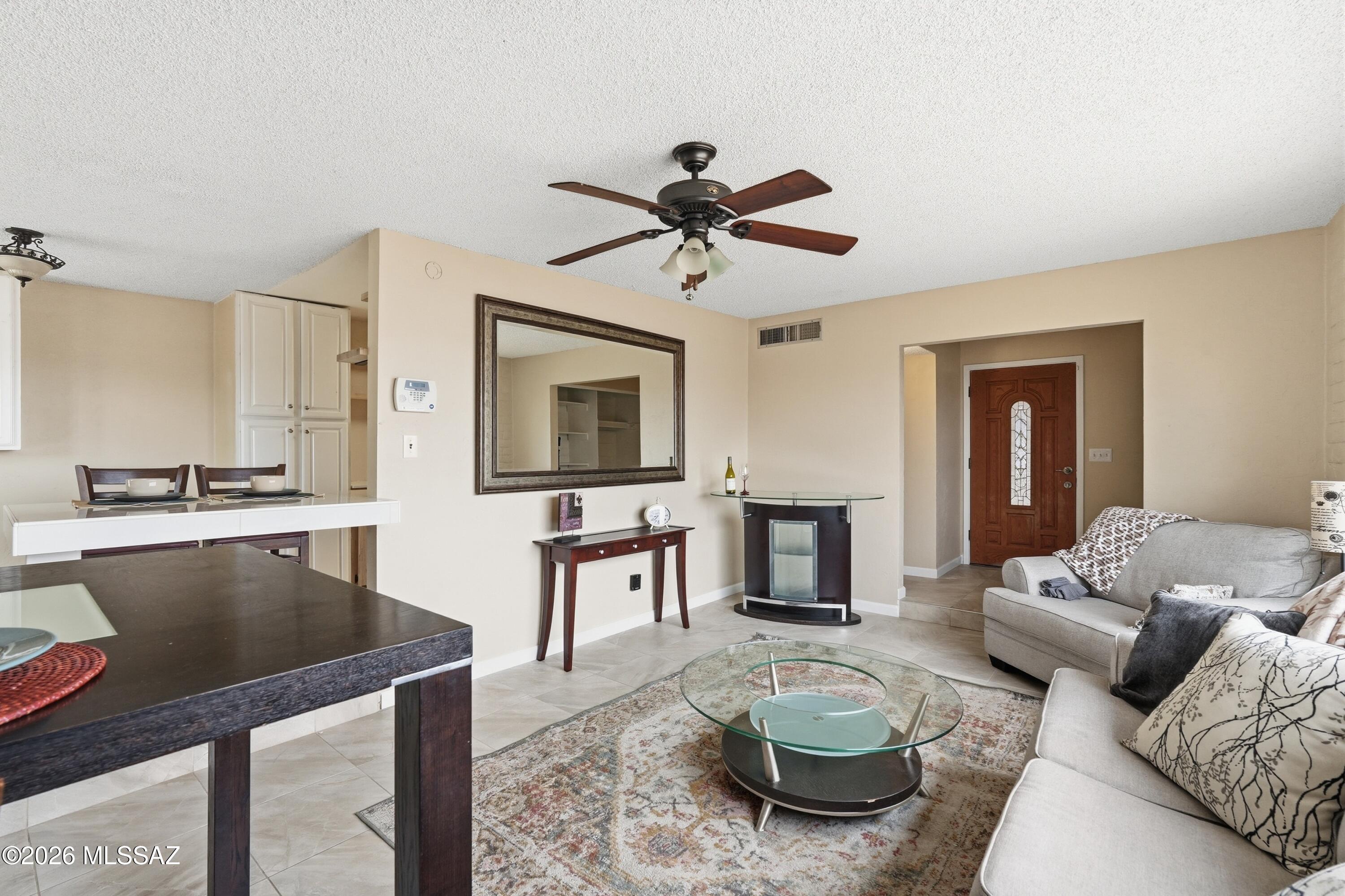 RANGE PRICE 285K-295K. Tucked away in a quiet cul de sac in the popular Stonegate community, this well-loved home offers 4 BR and 2 full BA and has a gorgeous mountain view. One of the most affordable 4BR SFRs of this size on the East side & no road noise! Much has been remodeled or replaced in the last few years, including the big ticket items: new roof, electric panel, H2O heater, windows, etc.  Kitchen has b-fast bar, high-end shelving, & beautiful marble countertops you can likely save to complement your choice of new kitchen cabinets. Or simply replace the cabinet and drawer fronts with your favorite style.  The HUGE yard is your pallette, get creative! No house directly behind allows for a nice private spot with a view. No HOA & low taxes. Close to Pima College, the library, & parks!