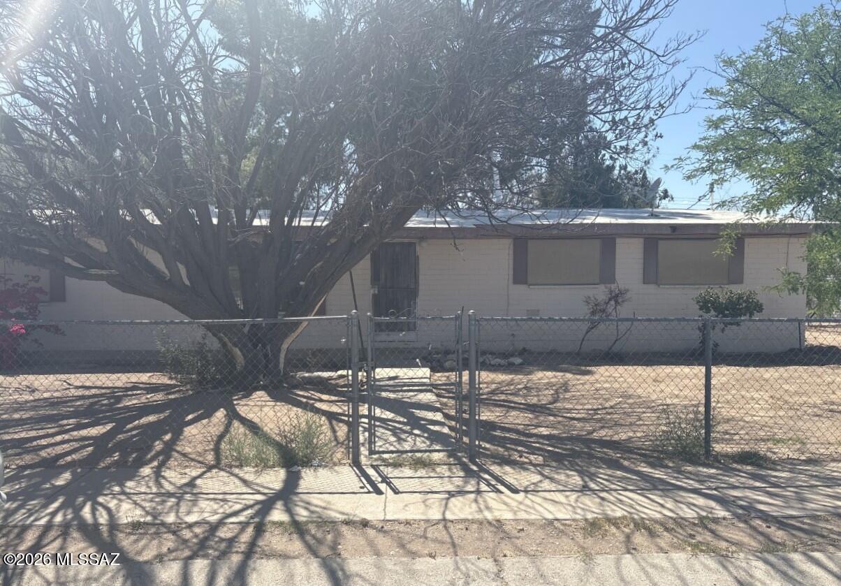 Discover timeless charm and spacious desert living at this classic 1960 single-family home in the established Manzanita Manor neighborhood! Offering 1,524 sq ft of comfortable living space with 2 bathrooms on a generous 0.31-acre lot, this property provides plenty of room to relax, entertain, or expand your outdoor oasis under Tucson's sunny skies. Nestled in a convenient southwest Tucson location, enjoy easy access to major routes, shopping, parks, and everyday amenities while embracing the privacy and potential of a well-sized lot. Whether you're looking for a solid starter home, a smart investment, or a blank canvas to personalize, this Mid-Century delivers exceptional value and endless possibilities in a proven, family-friendly community.