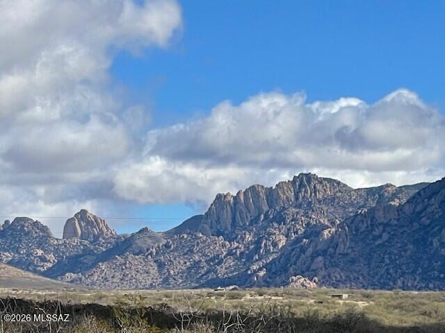 Dragoon Mountain Ranch is a gated community with lots 36 acres or more. Very private and designed for tranquility & agricultural experiences. 4,800' Elevation makes for mild seasons. Dramatic Granite formations & Boulder fields. Power to each lot, Seller brought power in approx 1,000' where the building pad could be w/ 400 amp pedestal. This subdivision is adjacent to the Coronado National Forest & State Trust Lands, Great for outdoor activities & wildlife. Easy Commute to Benson, Willcox, Sierra Vista, Tombstone, & Bisbee.