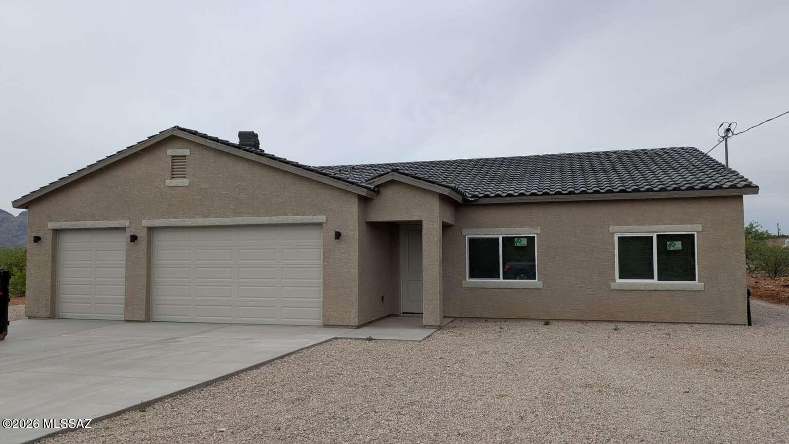 This is beautiful brand new construction home! Spacious open floor plan. This home features upgraded 10-foot ceilings, 8-foot interior doors, window blinds, kitchen with an island breakfast bar, gorgeous granite countertops, and stainless steel appliances. With 1,568 square feet of living space, this home includes three bedrooms, two full bathrooms, a laundry room, a three car garage with a 220-volt connection ready for electric cars, and a spacious backyard!