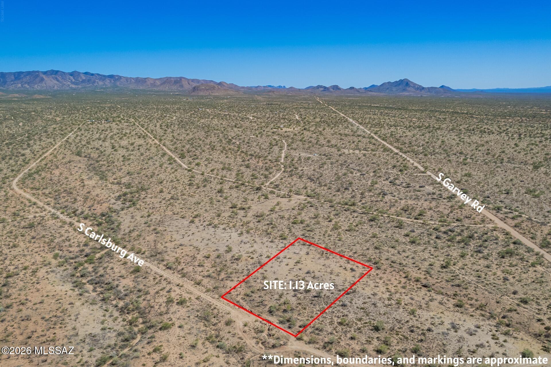 Beautiful 1.13 acre lot in Diamond Bell Ranch with sweeping desert and mountain views. Flat, usable parcel with plenty of space and privacy to enjoy peaceful rural living while still being within reasonable distance to Tucson amenities. Stunning Arizona sunsets and wide open skies. Septic required to build. Great opportunity to own land in a growing area of Tucson.