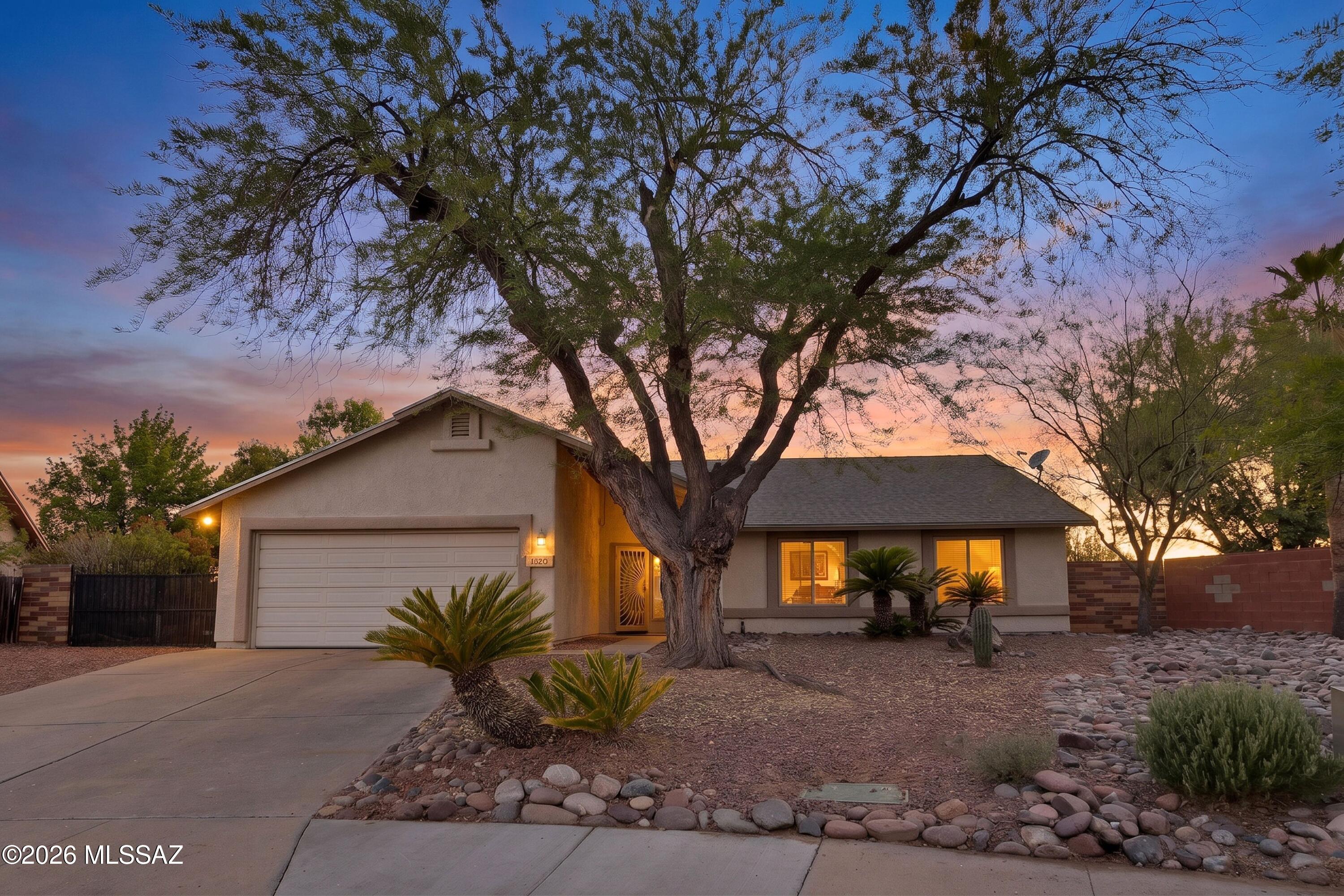 Welcome home to the perfect blend of comfort and outdoor living in this beautifully maintained 4-bed, 2-bath Oro Valley home. Situated on one of the largest lots in the subdivision provides you with exceptional privacy and space for the whole family. Enjoy Arizona living at its finest with a sparkling Pebble Tec pool, firepit, fruit trees, mountain views and double gate with room for RV parking. Major updates provide peace of mind, including a newer roof, HVAC system, and updated plumbing. With no HOA restrictions, you'll have the freedom to truly make this property your own. A rare opportunity to own a move-in ready home with room to play, entertain, and store all your toys in one of OV's most desirable locations! Range priced $399,900-415,000