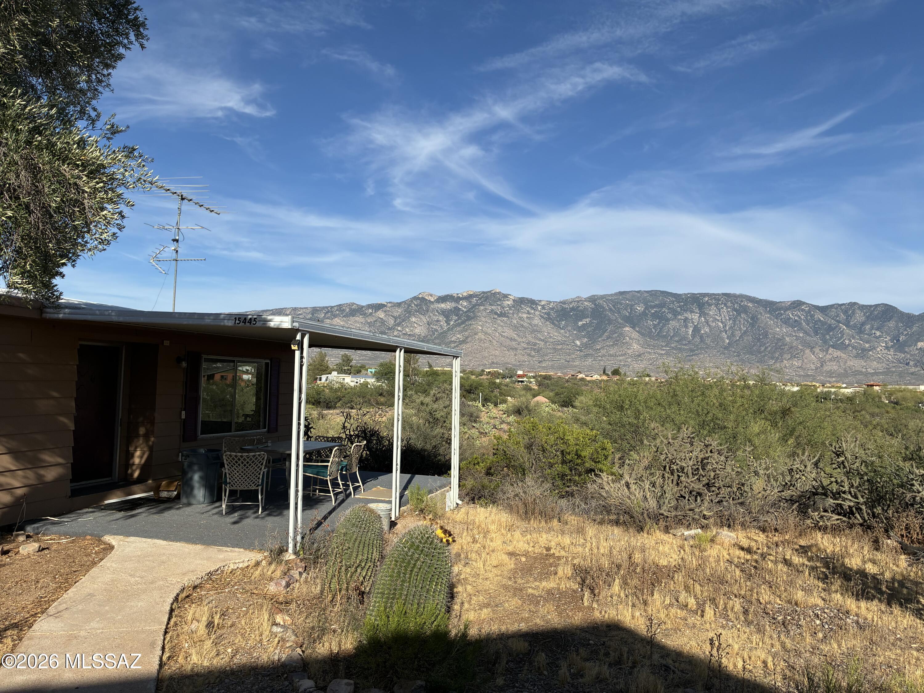 Welcome to an exceptional desert retreat at 15445 N Oracle Road in Tucson, where opportunity flexibility, and breathtaking scenery come together on 1.125 acres with stunning, unobstructed views of the majestic Santa Catalina Mountains. This unique property features two fully upgraded manufactured homes, each offering 3 bedrooms and 2 bathrooms, making it ideal for multi-generational living, rental income, guest accommodations, or a private family compound with room to spread out and enjoy the beauty of Southern Arizona. The spacious double-wide home provides comfortable, open-concept living with abundant natural light and panoramic mountain vistas, while the charming single-wide home offers its own welcoming layout. Welcome to an exceptional desert retreat at 15445 N Oracle Road in Tucson, where opportunity flexibility, and breathtaking scenery come together on 1.125 acres with stunning, unobstructed views of the majestic Santa Catalina Mountains. This unique property features two fully upgraded manufactured homes, each offering 3 bedrooms and 2 bathrooms, making it ideal for multi-generational living, rental income, guest accommodations, or a private family compound with room to spread out and enjoy the beauty of Southern Arizona. The spacious double-wide home provides comfortable, open-concept living with abundant natural light and panoramic mountain vistas, while the charming single-wide home offers its own welcoming layout.

and equally impressive views. Both residences have been thoughtfully updated and are completely move-in ready, allowing you to immediately enjoy the property or begin generating income potential. One of the property's standout features is the convenience and independence of each home being separately metered for electric, gas, and water, creating exceptional flexibility for owners and tenants alike. The double wide is ground set and has a level entry with no worry of having to climb steps, perfect for those of us that have challenges navigating stairs. With over an acre of land, there is ample space for outdoor entertaining, RV parking, gardening, recreational vehicles, or simply enjoying the peaceful desert surroundings and spectacular Arizona sunsets. Whether you are seeking an investment opportunity, a dual-living setup, or a serene retreat with endless possibilities, this property delivers rare versatility in a highly desirable North Tucson location.
Experience the perfect blend of privacy, functionality, and unforgettable mountain views at 15445 N Oracle Road -- a truly special property ready for its next chapter. There is easy access from Thistle 1st driveway to the north 3rd home on the right.