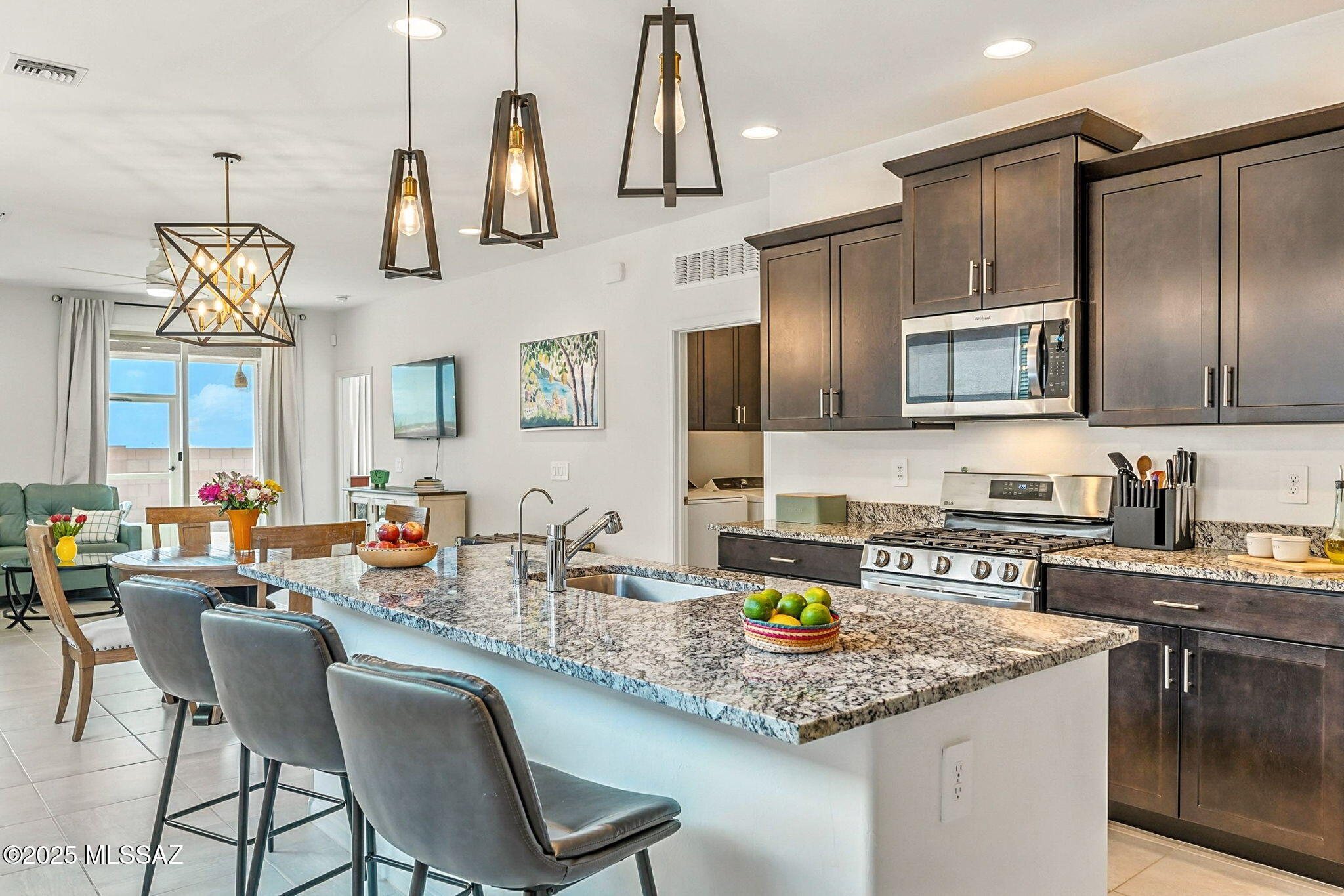 This stylish, newly constructed, single-story home features 3 bedrooms and 2 bathrooms, designed for both comfort and elegance. The open-concept layout includes a 
screened in, covered patio off the great room, perfect for enjoying the surrounding desert views. Interior highlights include mocha cabinetry, quartz countertops, tile 
flooring, and soft neutral carpeting for a cohesive, modern aesthetic. Located in the tranquil Hanson Ridge community of Vail, Arizona, the home offers scenic views of 
the Rincon Mountains and access to the top-rated Vail School District. With convenient proximity to I-10 and major employment hubs, commuting is effortless.