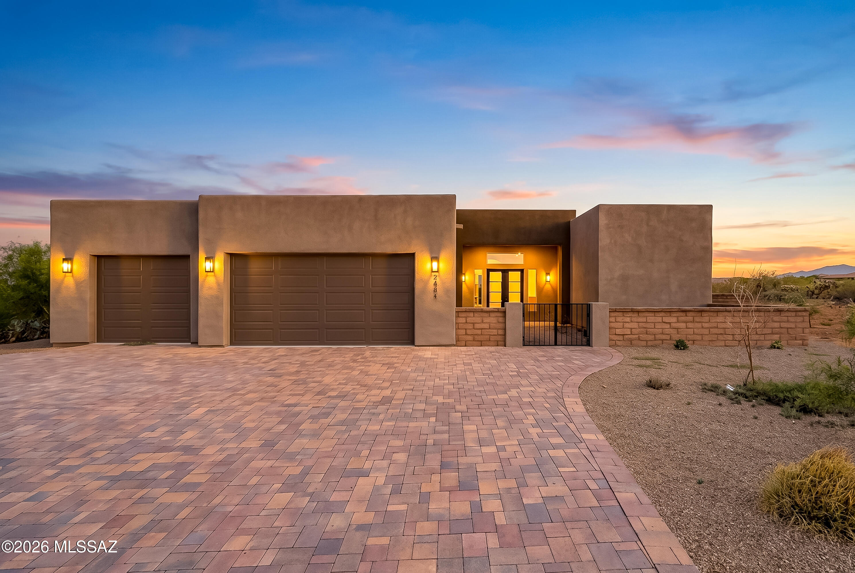 Welcome to your sanctuary in the prestigious gated community of Stone House, where luxury meets modern living in this exceptional 4-bedroom, 3-bath home. Set on nearly an acre of beautifully landscaped grounds, this residence offers an inviting and tranquil retreat that is both stylish and functional. As you enter, you are greeted by an expansive open floor plan with elegant tile flooring, complemented by high ceilings that enhance the spaciousness and natural light throughout.

The heart of the home is the exquisite kitchen, featuring sleek granite countertops and stainless-steel appliances, perfect for culinary adventures and entertaining guests. Each of the three bathrooms is thoughtfully designed with modern elegance in mind, showcasing contemporary showers that create a spa-like - experience. The primary suite is a true sanctuary, complete with a spacious walk-in closet and an ensuite bath designed for relaxation and comfort.

Three additional bedrooms provide flexibility for family, guests, a home office, or creative space, making this home as versatile as it is beautiful.

The outdoor space offers endless possibilities for leisure, entertaining, gardening, or simply enjoying the peaceful surroundings. This property is a seamless blend of sophistication and comfort, making it the perfect place to call home in the highly desirable Stonehouse community. Don't miss the opportunity to experience this exceptional lifestyle!