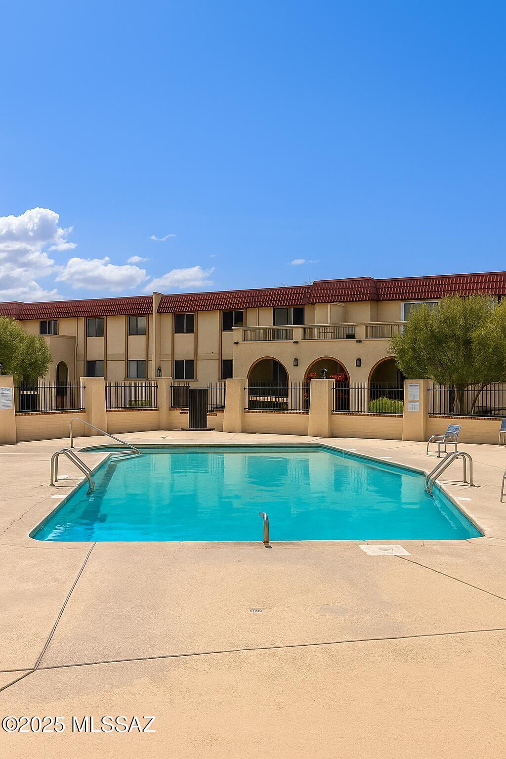 Welcome to this custom 2-bedroom, 2-bathroom ground-floor condo,  few units in the community with this desirable layout. This turn-key home offers tile flooring throughout the main living areas, luxury plank flooring in the bedrooms, and an open-concept floor plan that feels bright and spacious.The large master suite includes a generous walk-in closet, and its own full bathroom. Ceiling fans in both bedrooms keep the space comfortable year-round. With plenty of natural light and the efficiency of a ground-floor home, this condo offers comfort while keeping utility costs lower. Located in a prime area close to shopping centers, restaurants, and major crossroads, you'll enjoy convenience at your doorstep. HOA covers water, sewer, trash, gas and ammenities.