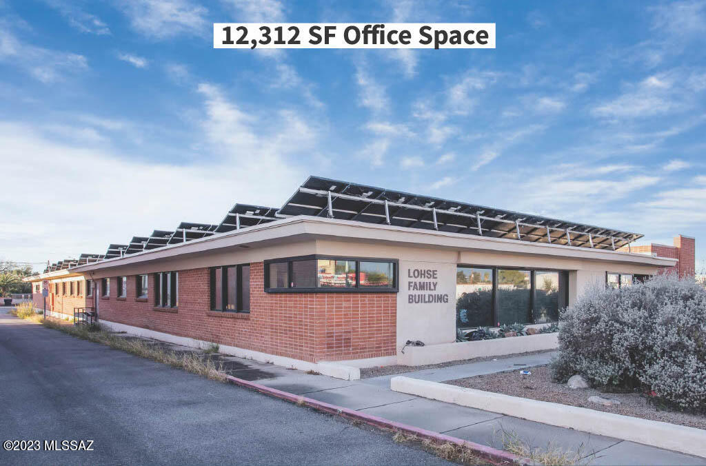 12,312 square feet of office space on Broadway frontage with large parking lot. Located in the Sunshine Mile making it potentially eligiable for Rio Nuevo funding. This classic mid-century property features a lobby, reception area, and multiple well-appointed offices and collaborative work areas.  The building was previously used as an American Red Cross office space. Zoned C-1, this versatile property can be adapted for various purposes, including offices, retail, school/daycare. The property has a large solar system generating approximately 4500 KWH monthly as well as a full sprinkler system.  New AC is being installed. Floor plan included in the additional documents.