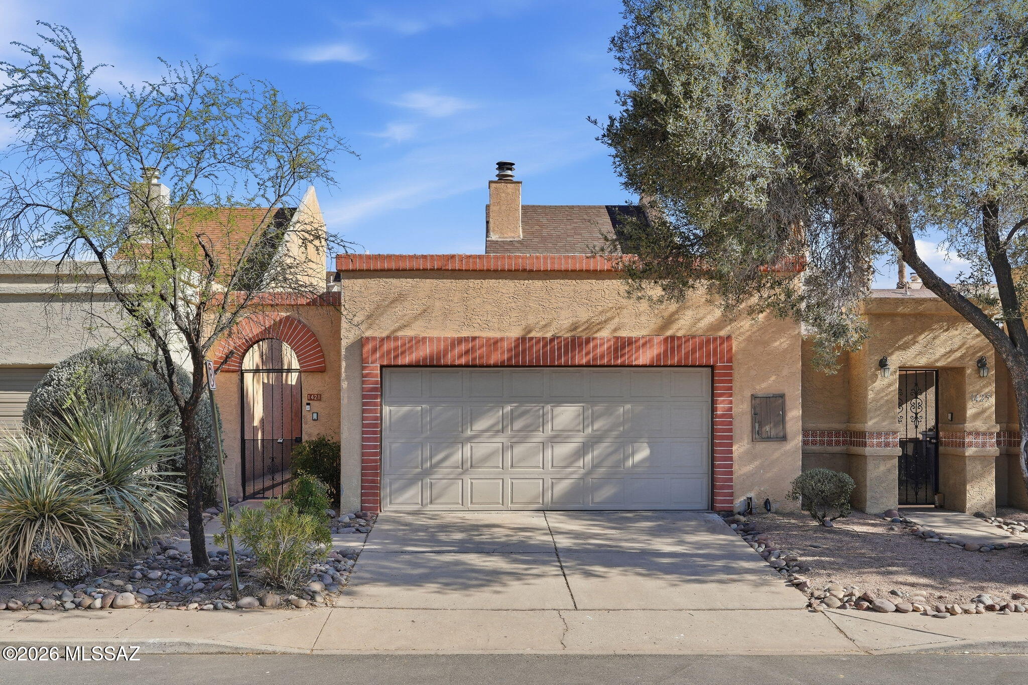 Welcome to this beautifully updated 3-bedroom, 2-bath home located on Tucson's desirable west side. Featuring soaring high ceilings and a bright, open feel, this home offers a stylish blend of comfort and modern upgrades. The remodeled primary bathroom creates a relaxing retreat, while the updated kitchen showcases new cabinetry, elegant quartz countertops, and stainless steel appliances. Fresh interior paint and new carpet in the bedrooms make this home truly move-in ready.
Step outside to enjoy the charming private courtyard--perfect for morning coffee or evening gatherings. Conveniently located just minutes from Downtown Tucson, the University of Arizona, shopping, restaurants, and entertainment, this home offers the ideal combination of location, style, and everyday convenience.