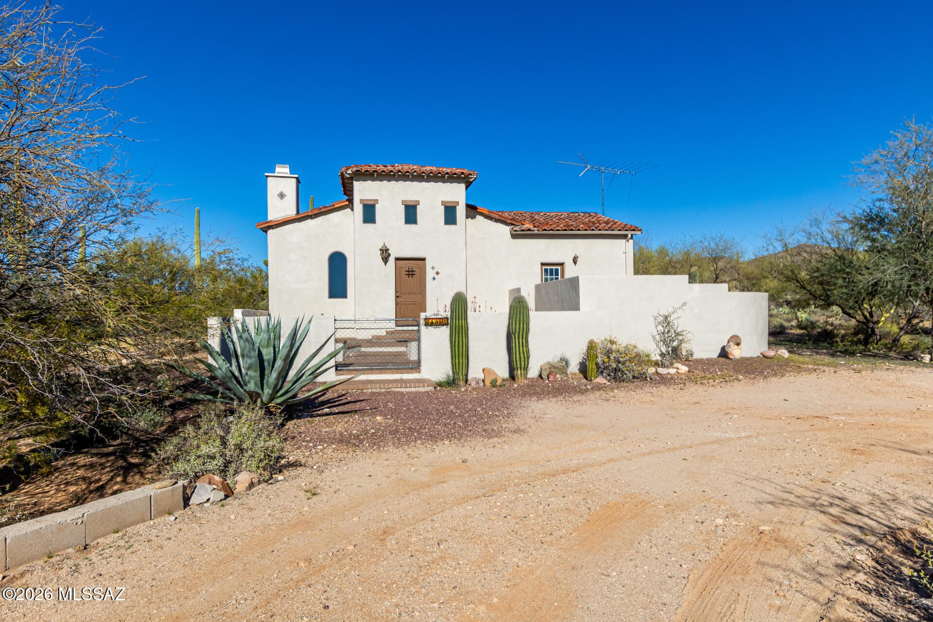 Seller will accept or counter offers between $310,000-$335,000.

Experience the beauty of desert living in this charming 2-bedroom, 1-bath Mediterranean-style home set on 3 serene acres with breathtaking views of the Tortolita Mountains. Designed with classic charm, the home features stucco exterior walls, a tile roof, graceful archways, and warm wood accents that create a welcoming atmosphere.  Entire home was just completely repainted!

Step outside to a fully enclosed backyard that offers privacy and space--perfect for pets, entertaining, or relaxing under Arizona's colorful evening skies. The property also includes an RV hookup and plenty of room to expand, giving you the opportunity to add a guesthouse, workshop, or barn. Enjoy peaceful country living surrounded by wide-open desert landscapes and unforgettable sunsets. This is your chance to own a special piece of the Southwest and create the lifestyle you've been dreaming of.