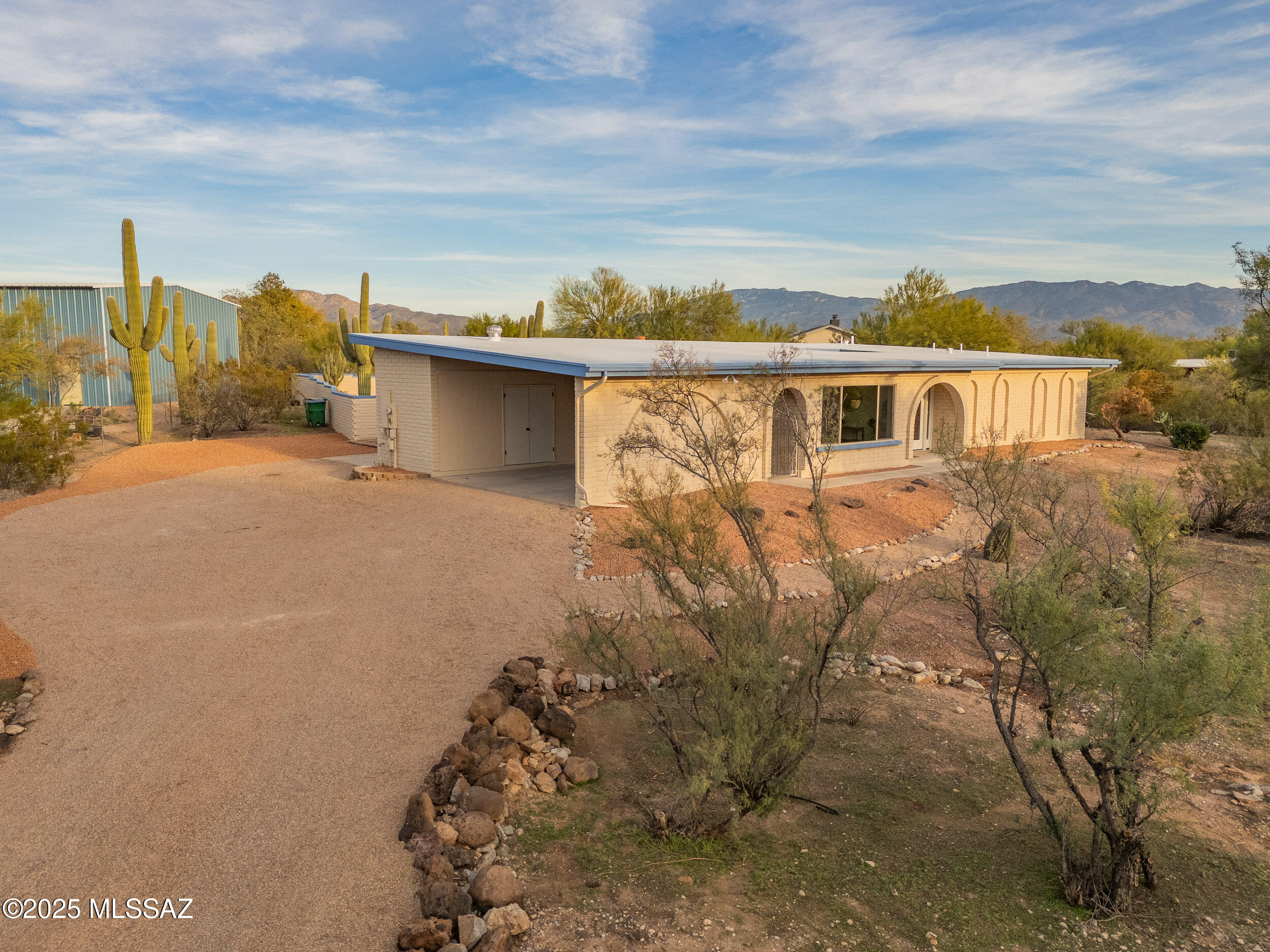 Discover a true gem—this beautifully remodeled 4-bedroom, 2.5-bath home sits on just under an acre and blends timeless architecture with modern upgrades. A rare interior atrium anchors the home, filling the space with natural light and creating a distinctive architectural statement you don't often find. The thoughtfully updated interior features all-new flooring throughout, granite countertops, and a refreshed layout that feels both inviting and refined. Recent major improvements include a new HVAC system and water heater, offering peace of mind and energy efficiency. Step outside to your private backyard oasis complete with a sparkling pool and expansive lot, perfect for entertaining, relaxing, or future possibilities. This one-of-a-kind property offers space, character, and quality upg