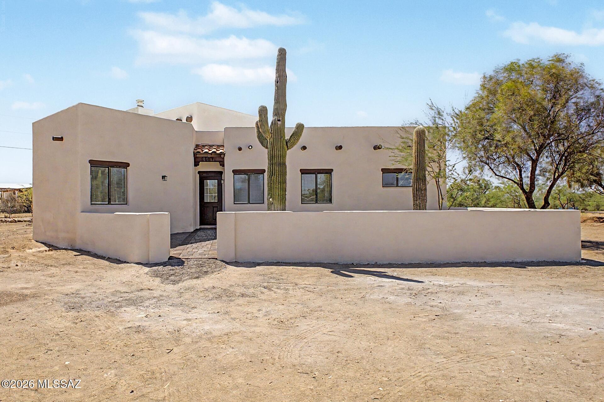 Seize the opportunity to own this lovely 4-bedroom home with fantastic mountain views! Discover the blend of style and comfort in the inviting living areas, featuring wood-look floors, soaring ceilings, exposed beams in all the right places, a Kiva fireplace with wrap-around bench finished w/ a modern marbled quartz countertop for cozy winter evenings, and a neutral palette that creates a comfortable atmosphere. The pristine kitchen boasts elegant quartz countertops, and espresso cabinets w/ crown moulding. Brand new stainless steel appliances ensure a seamless cooking experience. The main bedroom is a true retreat, offering a private bathroom for added convenience. Spacious front & back yards, perfect for entertaining, are ready for your personal touch! Make it yours now! Agent/Owner