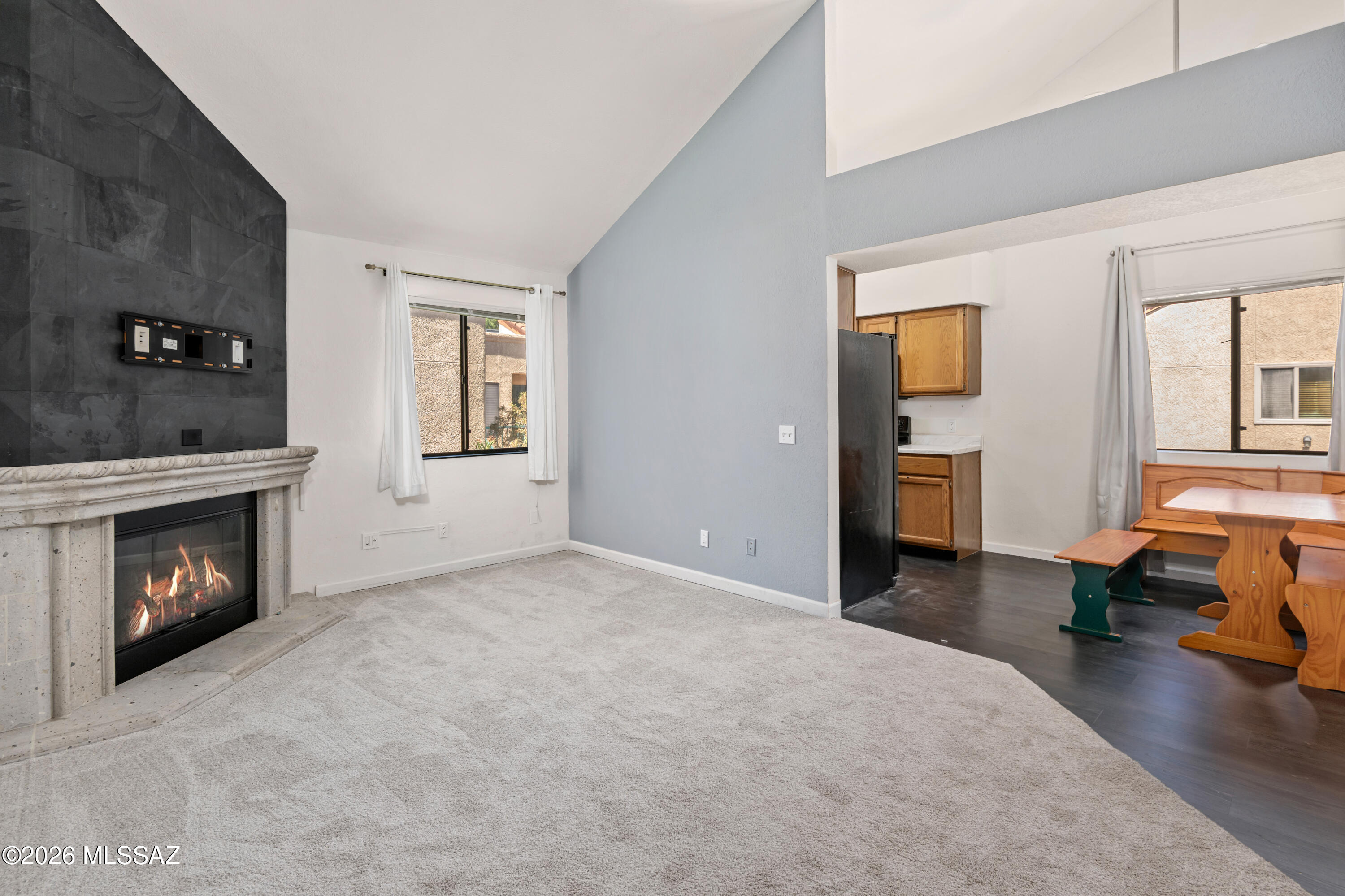 Step inside this Park Place Condominiums and discover a space designed to live larger than expected. Vaulted ceilings, a dramatic fireplace, in-unit laundry, generous storage, an updated bath with glass detailing, and virtually staged inspiration create instant curiosity. The built-in Murphy bed adds a smart lifestyle advantage--open the room when you need sleeping space, then reclaim it for a home office, workout area, studio, or lounge. Enjoy a sunny community pool plus a central Tucson location close to the Tucson Racquet Club The Loop, Rillito River path, dining, shopping, fitness, the University of Arizona, downtown, and the Catalina Foothills. Schedule your showing at our Grand opening on Saturday 7/11/26 and see what the photos only begin to reveal. Beyond the blue front door, this Park Place Condominiums residence starts with a surprisingly open feel--soaring ceiling lines, soft natural light, and a living area anchored by a dramatic fireplace that immediately raises the question: how would you make this space your own? The dining nook offers a tucked-away moment near the entry, the in-unit laundry adds everyday convenience, and the bedroom areas reveal more flexibility than first meets the eye, including generous storage, built-ins, and virtually staged inspiration that hints at the home's potential without giving away the full experience. A refreshed bath with bold glass detailing and a sunny community pool setting complete the preview--but the best parts are the ones you'll want to discover in person.

Located at Park Place Condominiums near the Tucson Racquet Club, this home places you in a highly convenient Tucson location close to recreation, dining, shopping, and everyday essentials. The nearby Tucson Racquet Club area is known for active lifestyle amenities, easy access to central Tucson corridors, and proximity to outdoor favorites such as the Rillito River path and The Loop trail system. From local restaurants and coffee spots to nearby parks, fitness options, and quick connections toward the University of Arizona, downtown Tucson, and the Catalina Foothills, this location offers the kind of Tucson condo lifestyle buyers search for when they want comfort, convenience, and connection.

This is the kind of Tucson condo that deserves more than a quick scroll. Schedule your private showing at Park Place Condominiums and step inside to see how the vaulted living space, fireplace, smart storage, updated bath, and community pool access come together in person. Photos create curiosity--but the full feel of this home is waiting at the door.

act like a top tier marketing firm gather all the information you just wrote and revise it to be  800 characters
Thought for 8s

Step inside this Park Place Condominiums residence near the Tucson Racquet Club and discover a space that feels larger, brighter, and more intriguing than expected. Vaulted ceilings, a dramatic fireplace, in-unit laundry, generous storage, flexible bedroom spaces, an updated bath with glass detailing, and glimpses of virtually staged potential create just enough mystery to make an in-person tour essential. Outside your door, enjoy a sunny community pool and a coveted central Tucson location close to The Loop, Rillito River path, dining, shopping, fitness, the University of Arizona, downtown, and the Catalina Foothills. Photos start the story--schedule your showing and experience the rest.

include the murphy bed and its lifestyle benifits
Thought for a couple of seconds

Step inside this Park Place Condominiums residence near the Tucson Racquet Club and discover a space designed to live larger than expected. Vaulted ceilings, a dramatic fireplace, in-unit laundry, generous storage, an updated bath with glass detailing, and virtually staged inspiration create instant curiosity. The built-in Murphy bed adds a smart lifestyle advantage--open the room when you need sleeping space, then reclaim it for a home office, workout area, studio, or lounge. Enjoy a sunny community pool plus a central Tucson location close to The Loop, Rillito River path, dining, shopping, fitness, the University of Arizona, downtown, and the Catalina Foothills. Schedule your showing and see what the photos only begin to reveal.