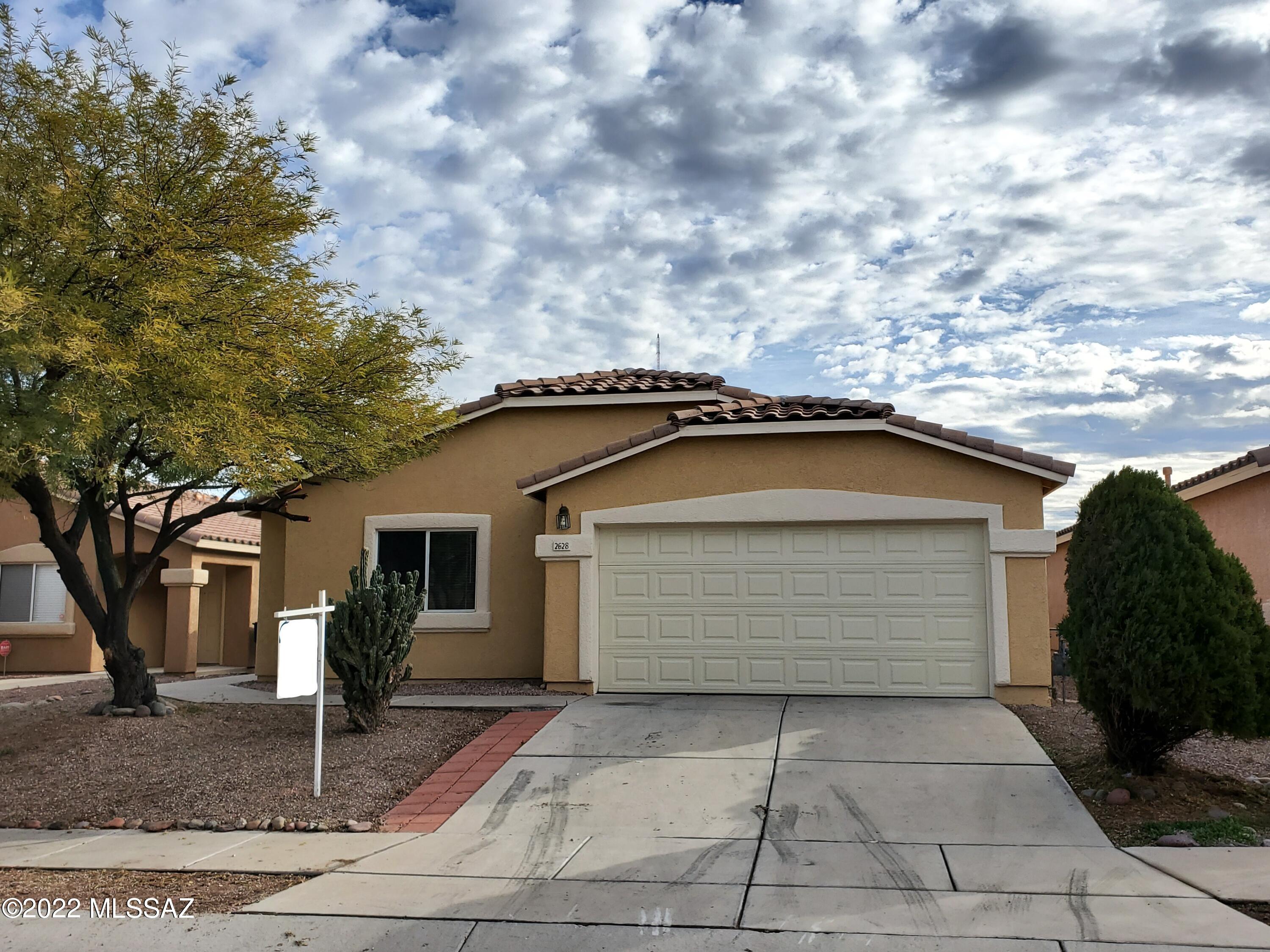 Spacious 3 bedroom + Den, 2 bath home with open floorplan. Conveniently located near I-10, Pima community college, and the University of Arizona. All tile throughout the house. All appliances included. 

Rental Requirements • Credit, Background Check, application fee • no criminal record • Income requirements (3x monthly rent at minimum) • No past broken leases or evictions • Pets ok (2 pet max, extra $25/month, 50lbs max, no aggressive breeds, $200 pet deposit) • Renters Insurance required