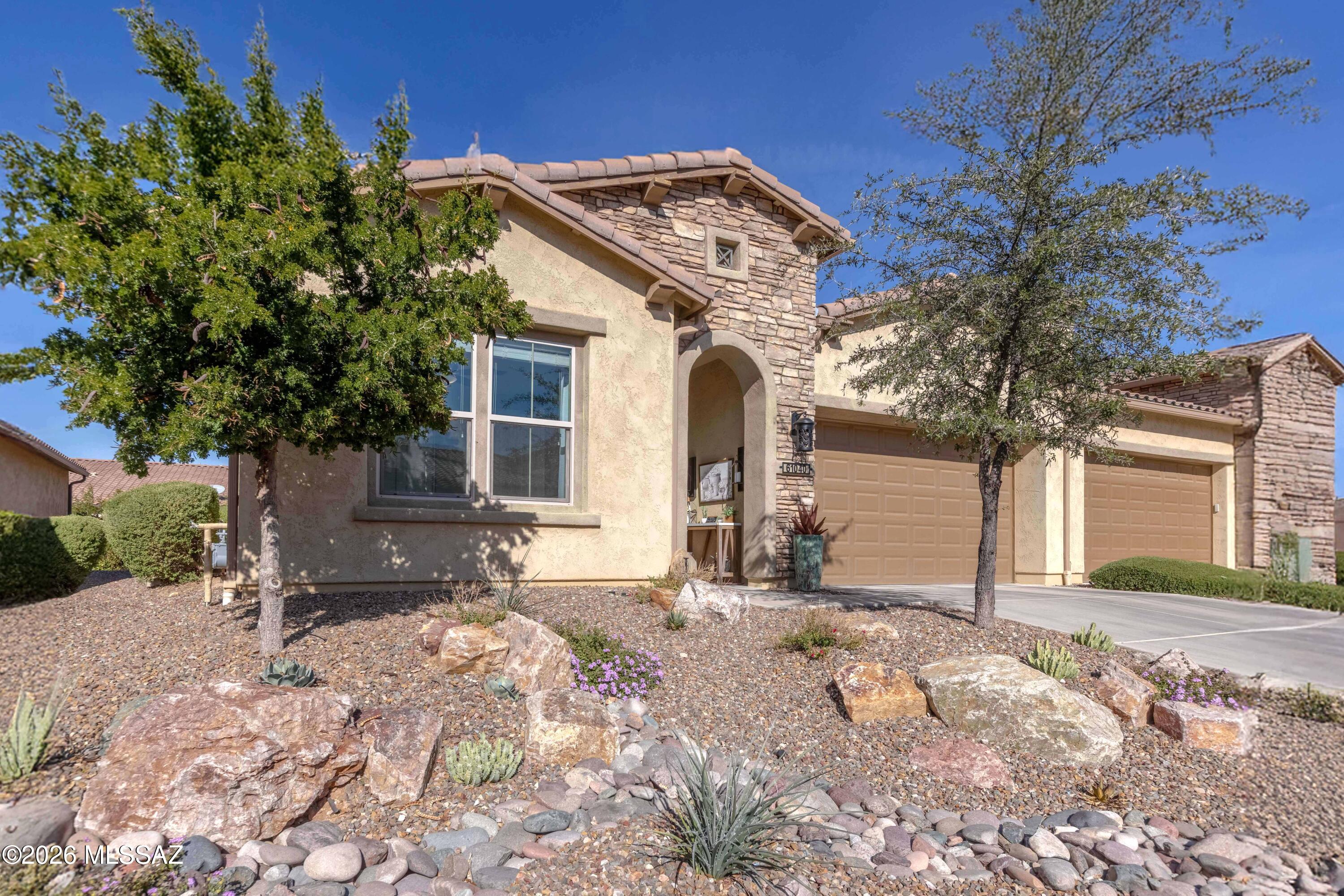 Welcome to this beautifully upgraded 2018 Viva villa in the gated 55+ community of SaddleBrooke Ranch, offering 1,638 sq ft of single-level living with 2 bedrooms, a den, an open great room, and soaring ceilings. The kitchen features quartz countertops, upgraded cabinetry, and stainless steel appliances. Since 2023, owners invested over $28,000 in upgrades: a custom primary closet, a custom built-in with electric fireplace, decorative glass front door, redesigned front-yard landscaping, upgraded lighting with dimmers and timed exhaust fans, framed bathroom mirrors, added electrical outlets in key storage areas, custom panel curtains, automatic exterior lighting, a freshly painted garage, snake fencing, and a covered paver patio with rolling shutters. HOA-maintained landscaping keeps this home low-maintenance, leaving time to enjoy SaddleBrooke Ranch clubhouse, pools, fitness center, spa, golf, and pickleball amid the Santa Catalina Mountains.  
Owner agent home.