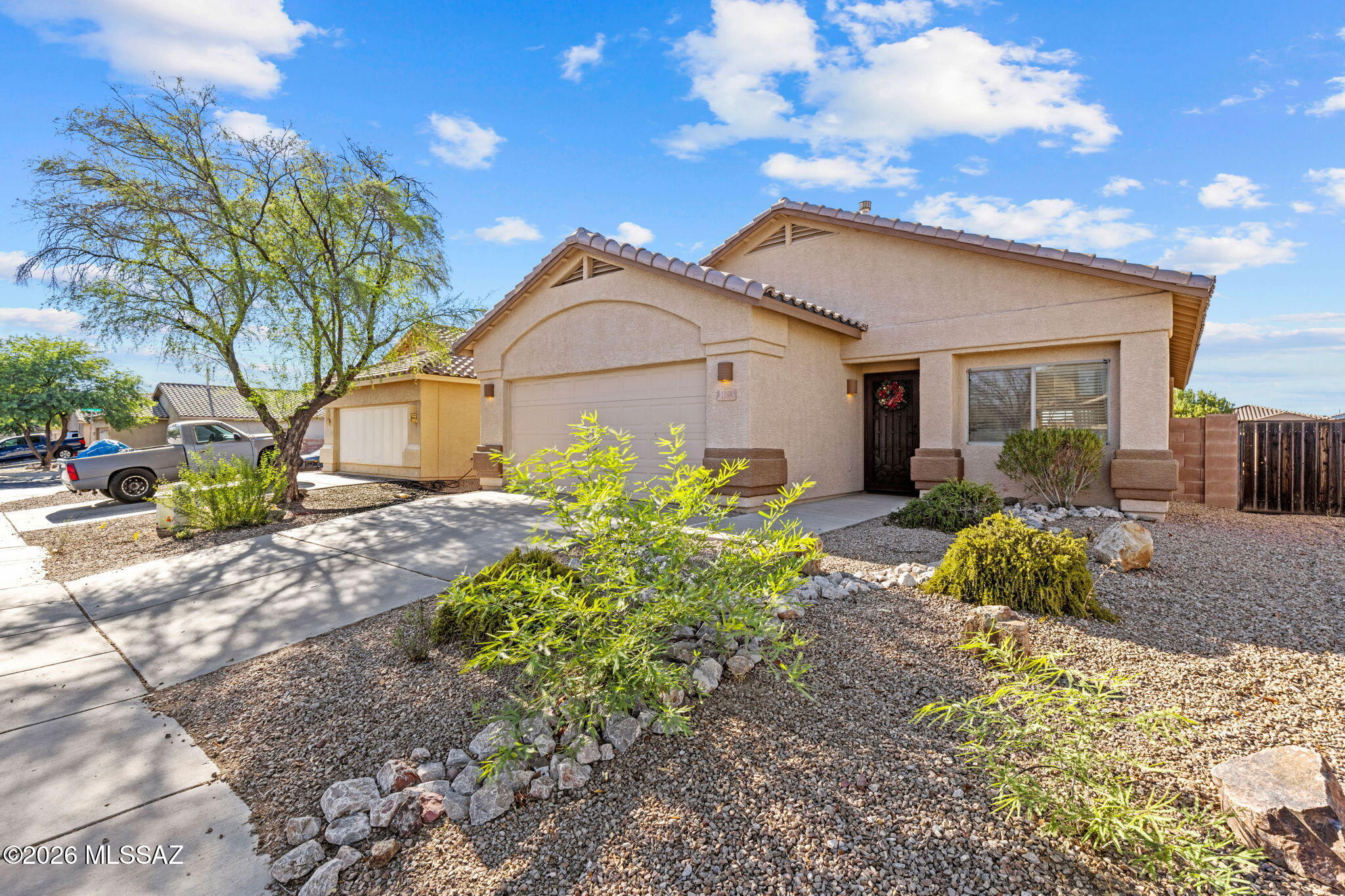 Charming home with 4 bedrooms and 2 baths in Rancho Marana. Just outside of Gladden Farms, but with access to all the amenities and a lower HOA, Rancho Marana features it's own parks, running trail connections and more. With custom painted cabinets and well appointed kitchen, this home is ready for the new owner. Finished back yard features paved patio, fire pit and more. Primary suite has a large walk in closet, and dual vanity bath. All appliances convey for a truly turn key home. Open floor plan features formal living and family room. No neighbor behind, and North facing yard for that afternoon shade. Solar is leased on a reasonable contract. No liens or financing to assume