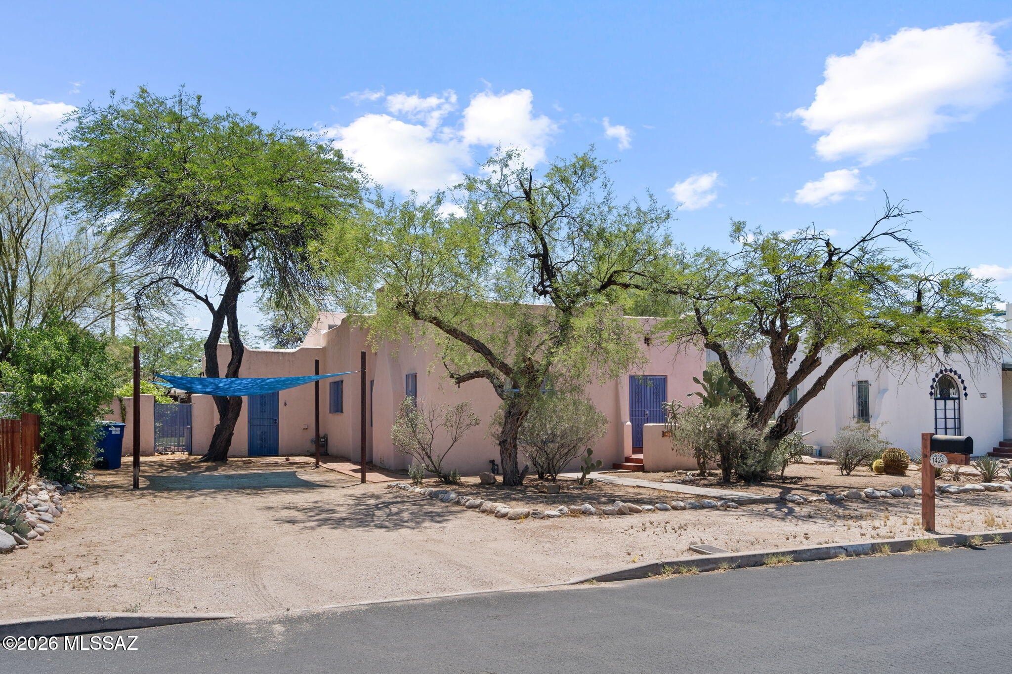 SELLER WILL ACCEPT OR COUNTER OFFERS BETWEEN $700,000 & $725,000.
Historic 1935 masonry stucco in Jefferson Park featuring 2,480 sq ft w 4 bdrms 3 ba., 2 new A/C. Split floor plan includes 2 primary suites w ensuite bath & walk-in closets.  Coved & wood beamed ceilings, archways, hardwood/tile/ flooring & living room wood-burning fireplace. Bright kitchen with updated appliances and custom countertops. Located on 9,675 sq ft lot with wrap-around patios, mature trees, grass and private backyard. APPROXIMATELY ROOM FOR 6 PARKING SPACES.  Walking distance to the UoA, Banner. & Mountain Avenue bike path. Improvements made in 2024
Tempstar 3 ton gas package unit with roofing repairs 2 stage SEER 2 15.2
Roof recoating (by Red Arrow Roofing LLC, warrantee till July 4, 2026)
New ceiling fans in 2-3 bedrooms
Refinishing of two bathtubs
New cabinet in one of two master bathrooms
Three new toilets